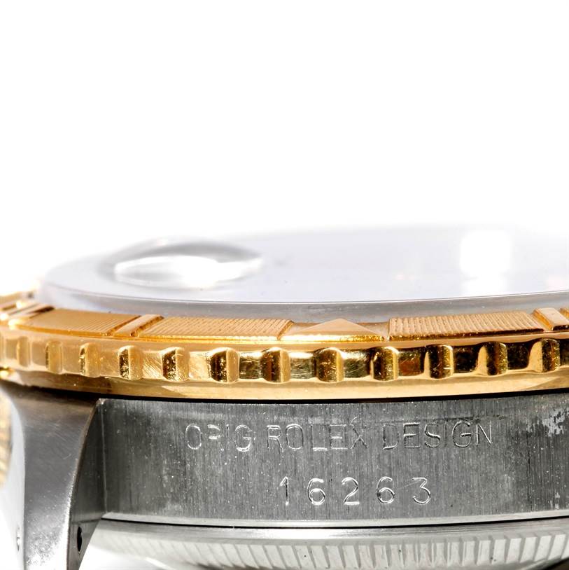 This image shows a close-up side view of the Rolex Turn-o-Graph 16263 Men's Steel and Gold (two tone) Black Dial 16263 Men's Steel and Gold (two tone) Black Dial watch, highlighting its bezel and case with engraved model number.