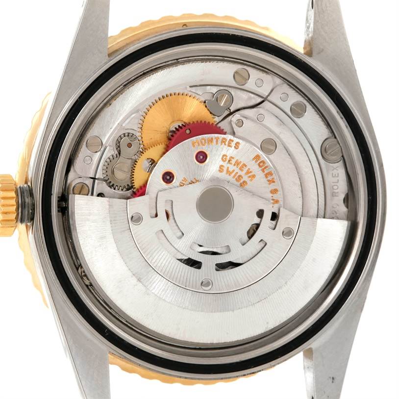 The image shows the back view of the Rolex Turn-o-Graph 16263 Men's Steel and Gold (two tone) Black Dial 16263 Men's Steel and Gold (two tone) Black Dial watch, revealing its internal mechanical movement and components.
