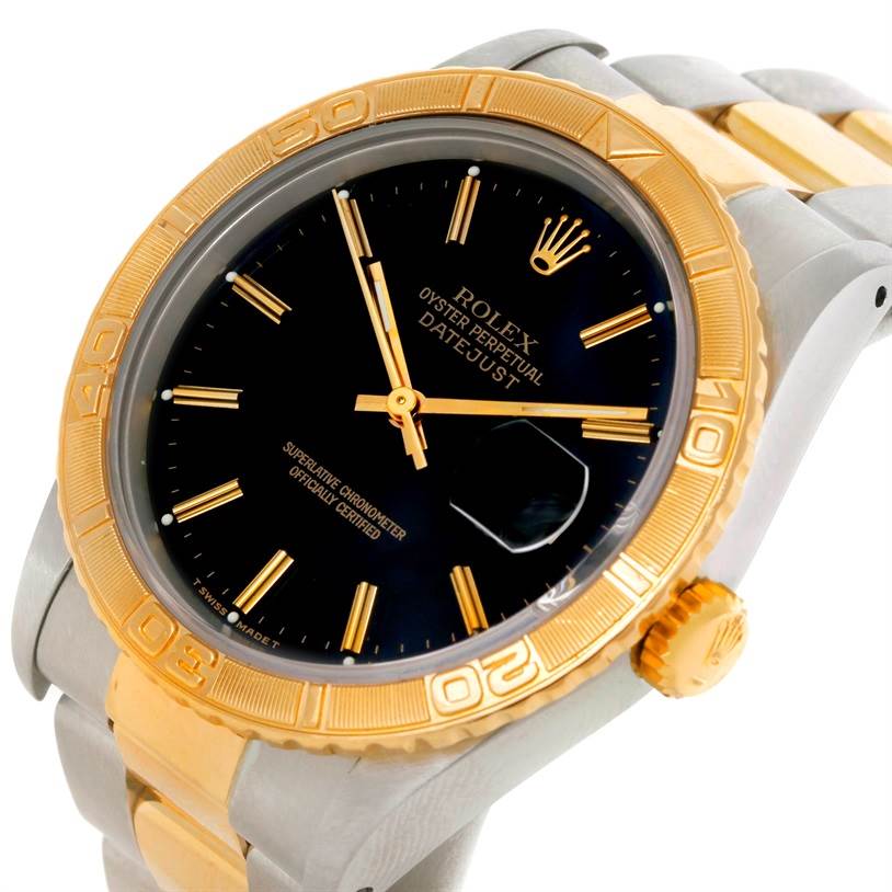 The image shows a Rolex Turn-o-Graph 16263 Men's Steel and Gold (two tone) Black Dial 16263 Men's Steel and Gold (two tone) Black Dial watch at an angled view, highlighting its gold bezel, black dial, and two-tone bracelet.