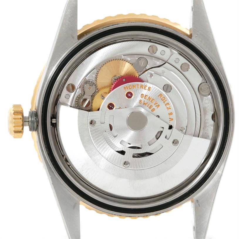 The image shows the back view of a Rolex Turn-o-Graph 16263 Men's Steel and Gold (two tone) Beige Dial 16263 Men's Steel and Gold (two tone) Beige Dial watch, revealing its internal mechanical movement components.
