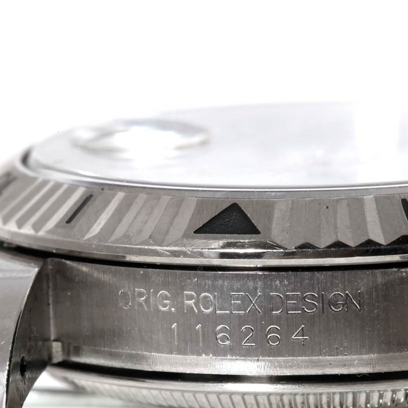 The image shows a close-up of the side view of the Rolex Turn-o-Graph 116264 Men
s Stainless Steel White Dial 116264 Men
s Stainless Steel White Dial model, highlighting the bezel and serial number.