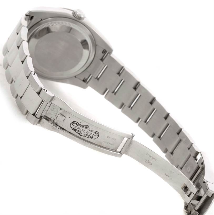 The image shows the back case and partially opened bracelet of a Rolex Turn-o-Graph 116264 Men
s Stainless Steel White Dial 116264 Men
s Stainless Steel White Dial watch.