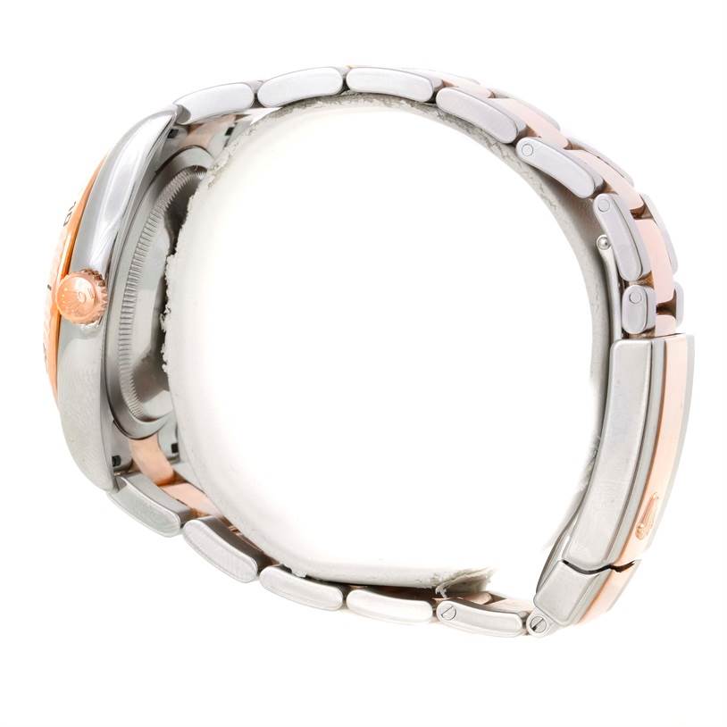 This image shows the side view of a Rolex Turn-o-Graph 116261 Men
s Stainless Steel Silver Dial 116261 Men
s Stainless Steel Silver Dial watch, highlighting its crown, bezel, case, and bracelet.