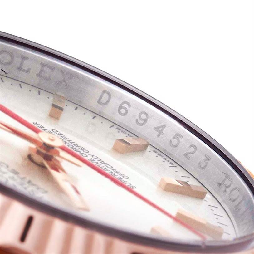 This close-up image shows the bezel, dial, and part of the serial number of the Rolex Turn-o-Graph 116261 Men
s Stainless Steel Silver Dial 116261 Men
s Stainless Steel Silver Dial watch.