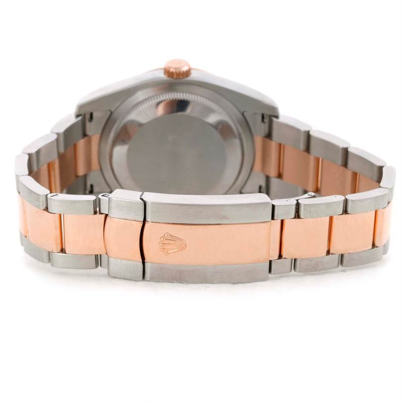 The image shows the back and bracelet of a Rolex Turn-o-Graph 116261 Men
s Stainless Steel Silver Dial 116261 Men
s Stainless Steel Silver Dial watch, highlighting its two-tone metal finish.