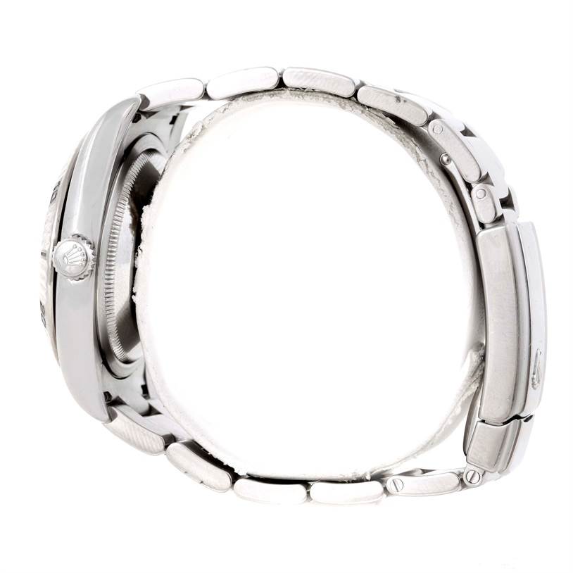 This image of the Rolex Turn-o-Graph 116264 Men's Stainless Steel White Dial 116264 Men's Stainless Steel White Dial watch shows a side view, focusing on the case, crown, and part of the metal bracelet.