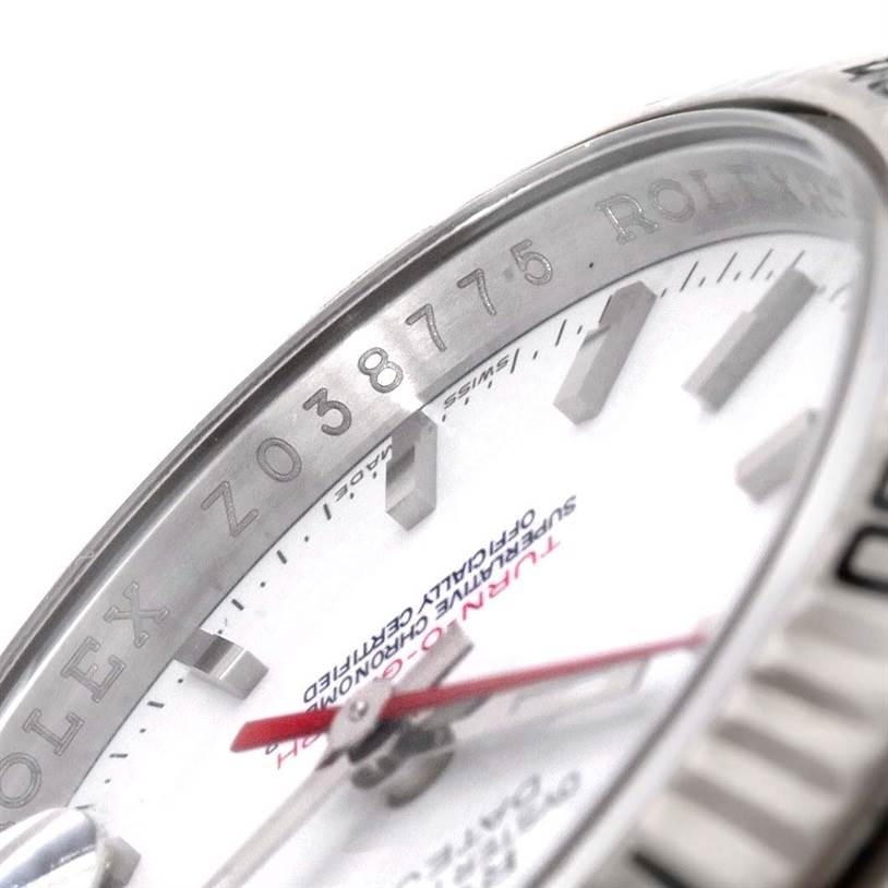 The image shows a close-up angle of the dial and inner bezel of the Rolex Turn-o-Graph 116264 Men's Stainless Steel White Dial 116264 Men's Stainless Steel White Dial watch, highlighting the model details and serial number.