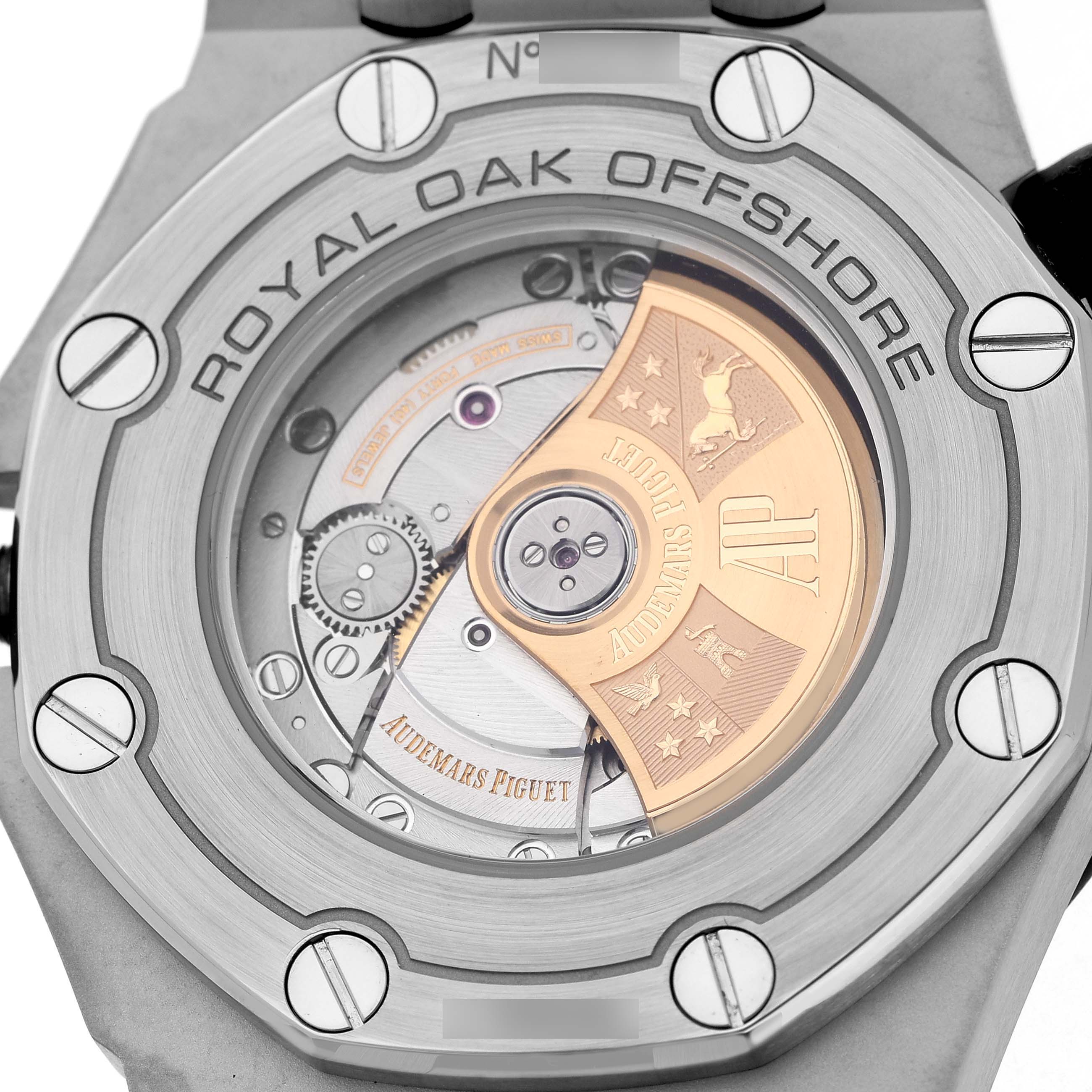 The image shows the movement from the back of the Audemars Piguet Royal Oak Offshore 15703ST Men's Stainless Steel Black Dial watch, highlighting the rotor and case details.
