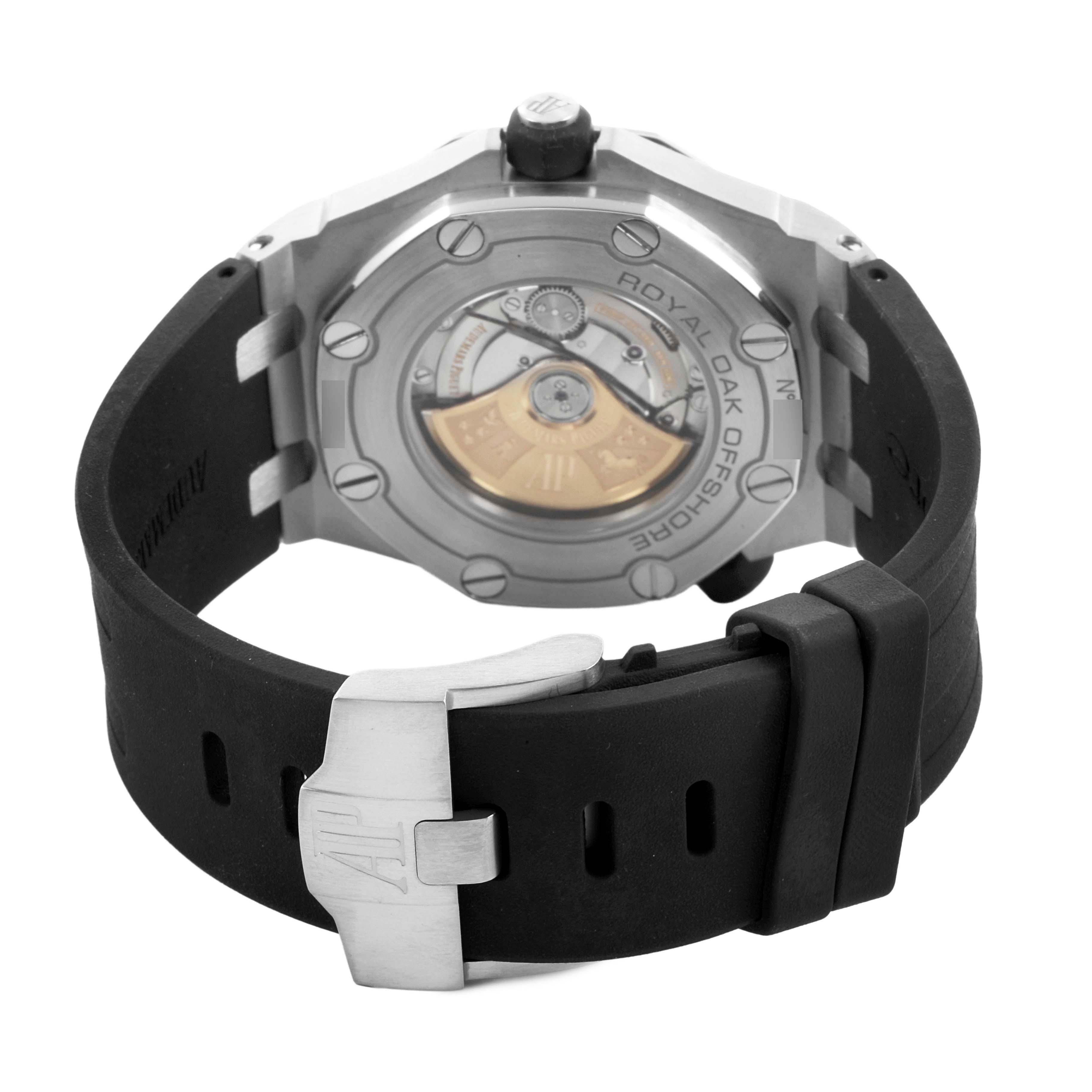 The image shows the back of the Audemars Piguet Royal Oak Offshore 15703ST Men's Stainless Steel Black Dial, highlighting its rotor, case back, and black strap.