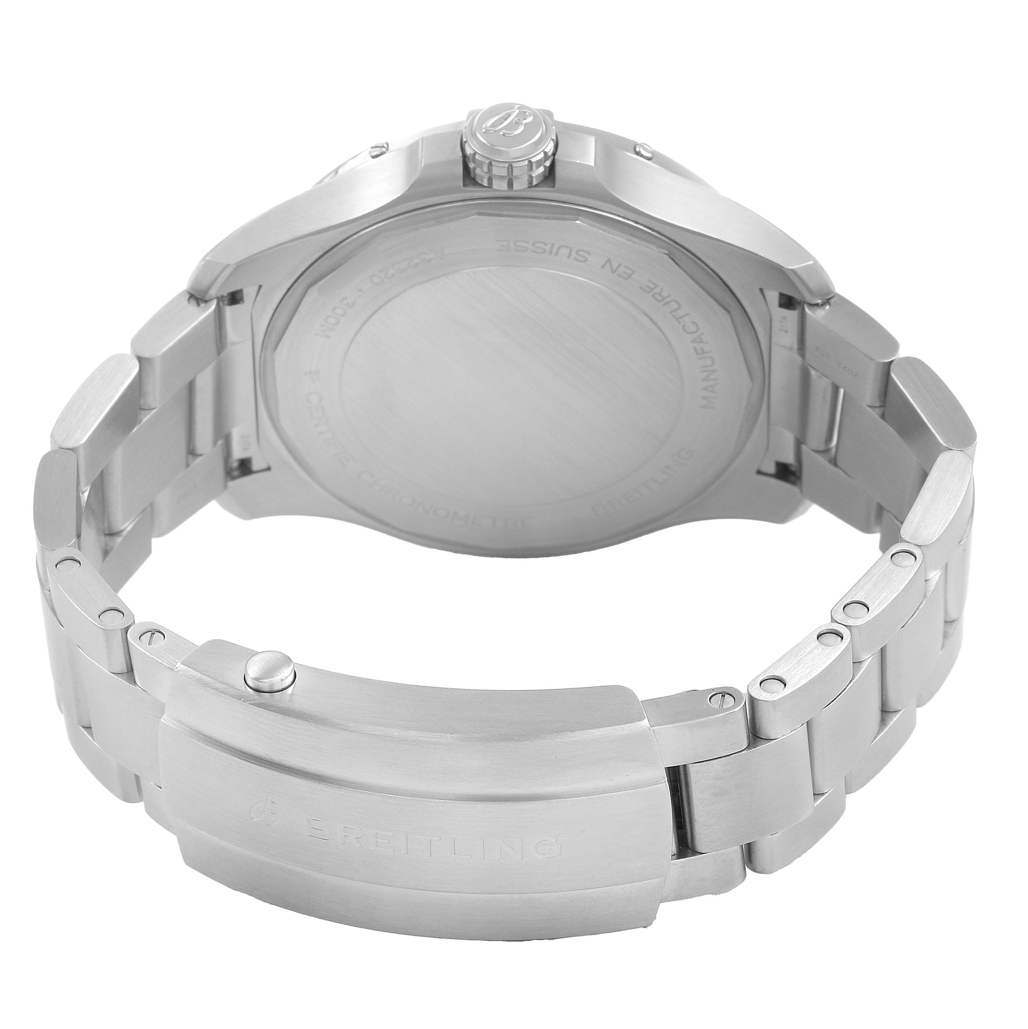 The image shows the back view of a Breitling Avenger A32320 Men's Stainless Steel Blue Dial model watch, focusing on the case back and stainless steel bracelet.