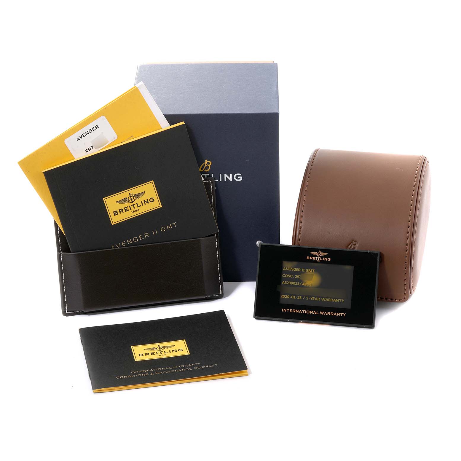 The image displays the packaging and accessories for a Breitling Avenger A32390 Men's Stainless Steel Mother of Pearl Dial A32390 Men's Stainless Steel Mother of Pearl Dial II GMT, including boxes, a case, manuals, and warranty card.