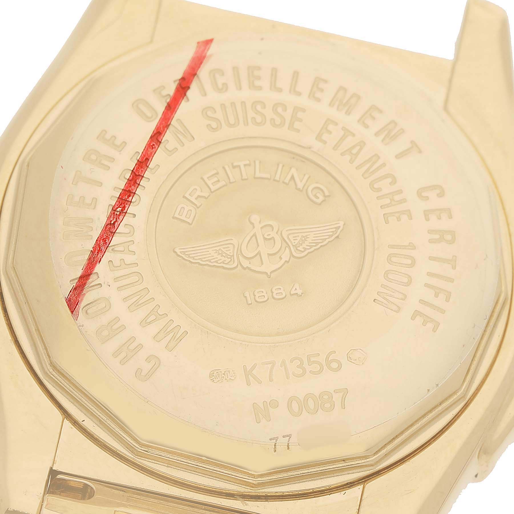 The image shows the back case of the Breitling K71356 Women's Yellow Gold Mother of Pearl Dial Cockpit Lady K71356 watch, displaying engraved details and brand markings.