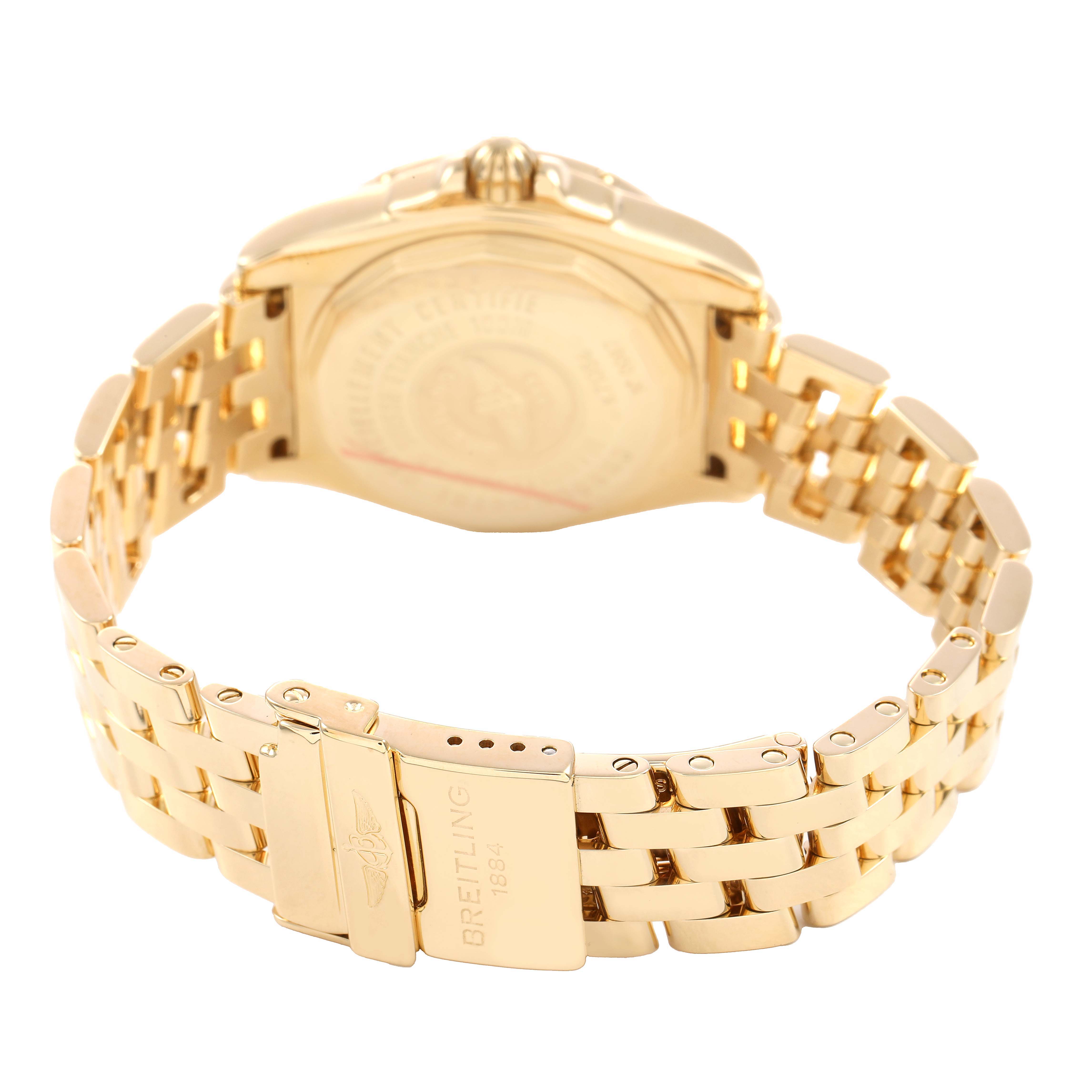 The image shows the back and clasp of the Breitling K71356 Women's Yellow Gold Mother of Pearl Dial Cockpit Lady K71356 watch, highlighting the yellow gold bracelet and engraved details.