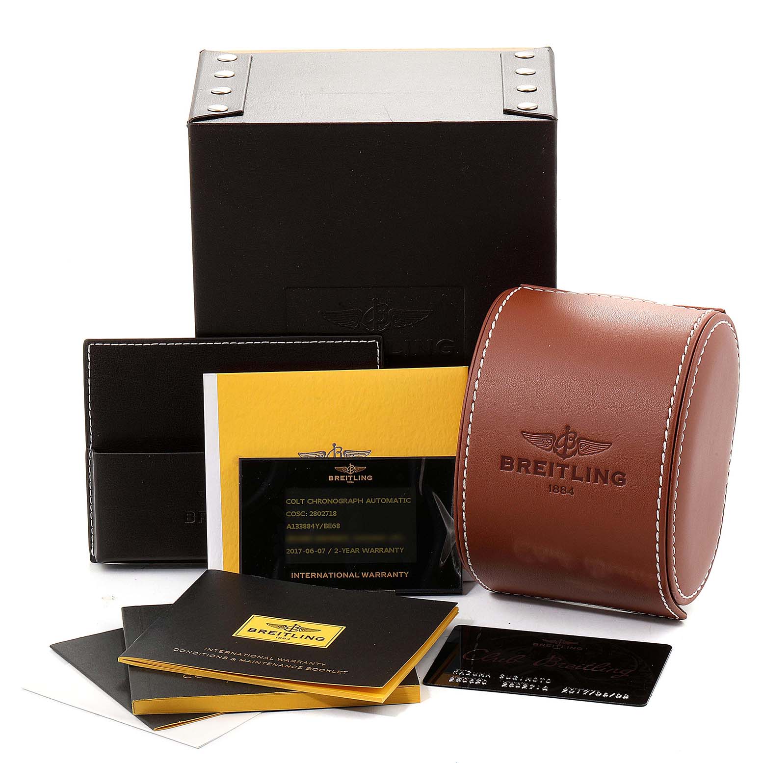 This image shows the packaging, manuals, warranty card, and a leather case for the Breitling Colt A13388 Men's Stainless Steel Black Dial A13388 Men's Stainless Steel Black Dial watch.
