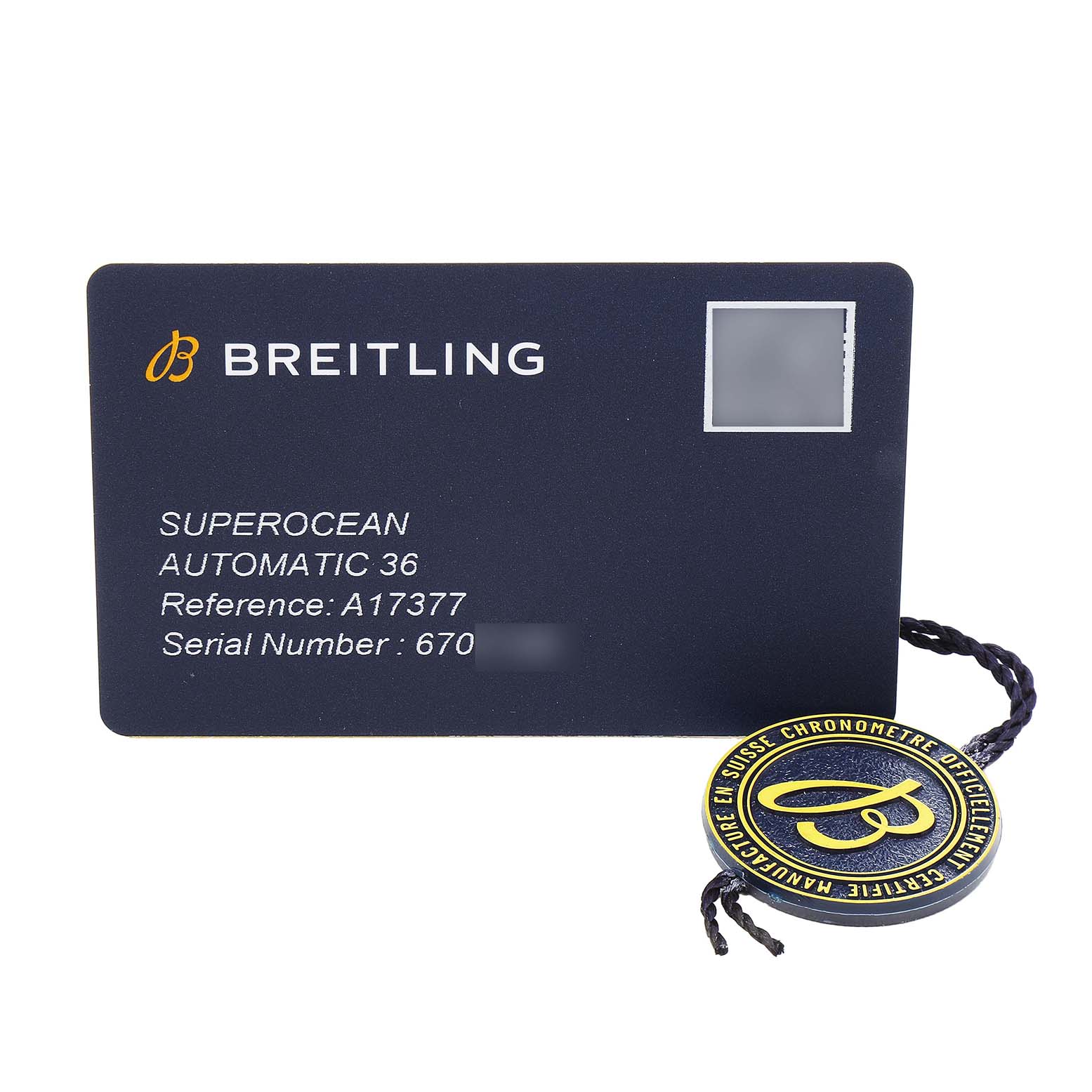 The image shows the warranty card and tag for a Breitling A17377 Women's Stainless Steel Orange Dial Superocean 36 model A17377.