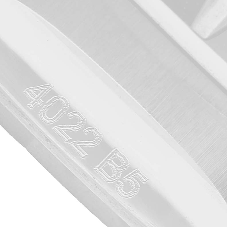 The image shows a close-up angle of the Breitling A17377 Women's Stainless Steel Orange Dial Superocean 36 model, focusing on a section of the watch with engraved markings.