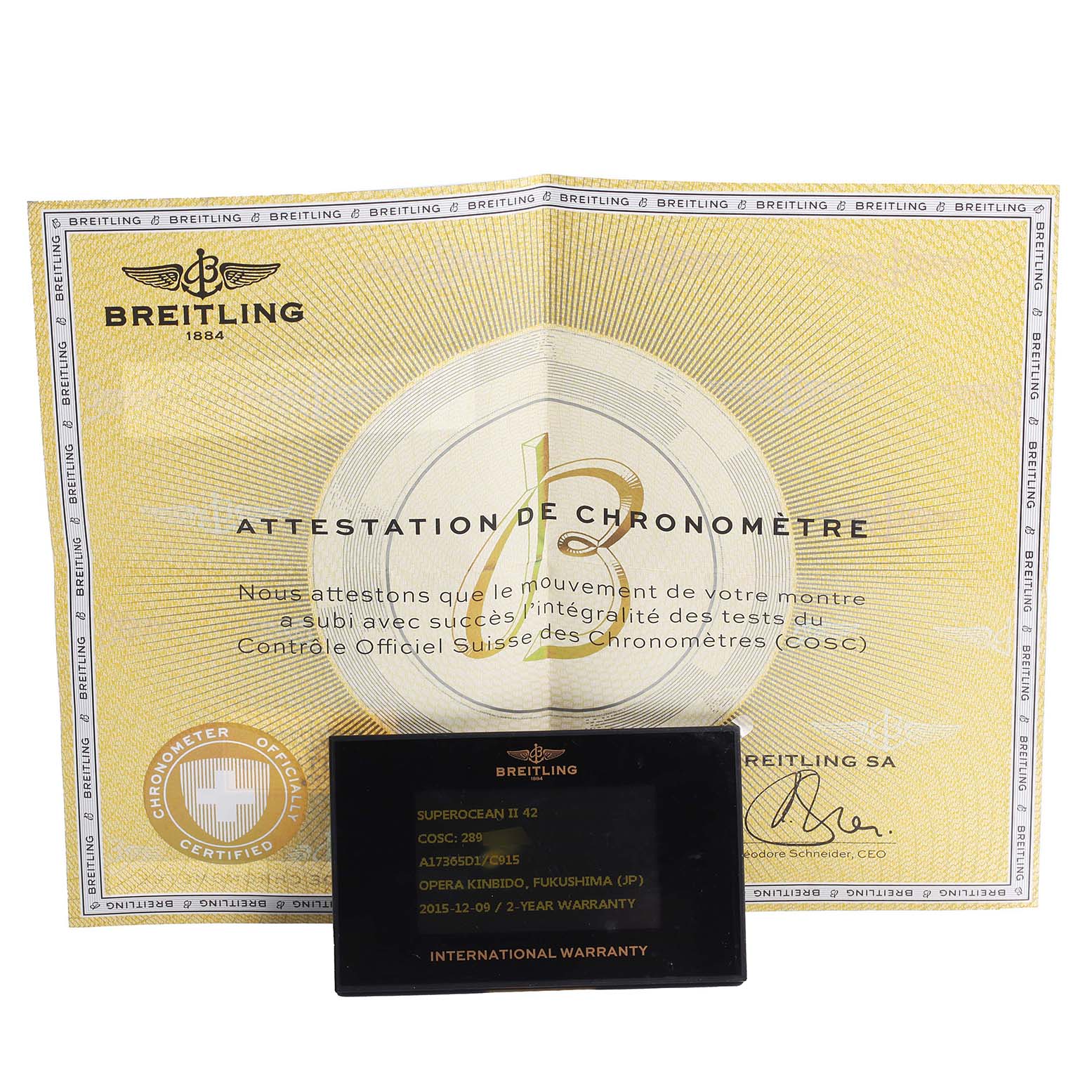 The image shows a Breitling Superocean A17391 Men's Stainless Steel Blue Dial A17391 Men's Stainless Steel Blue Dial certificate of chronometer and an international warranty card.