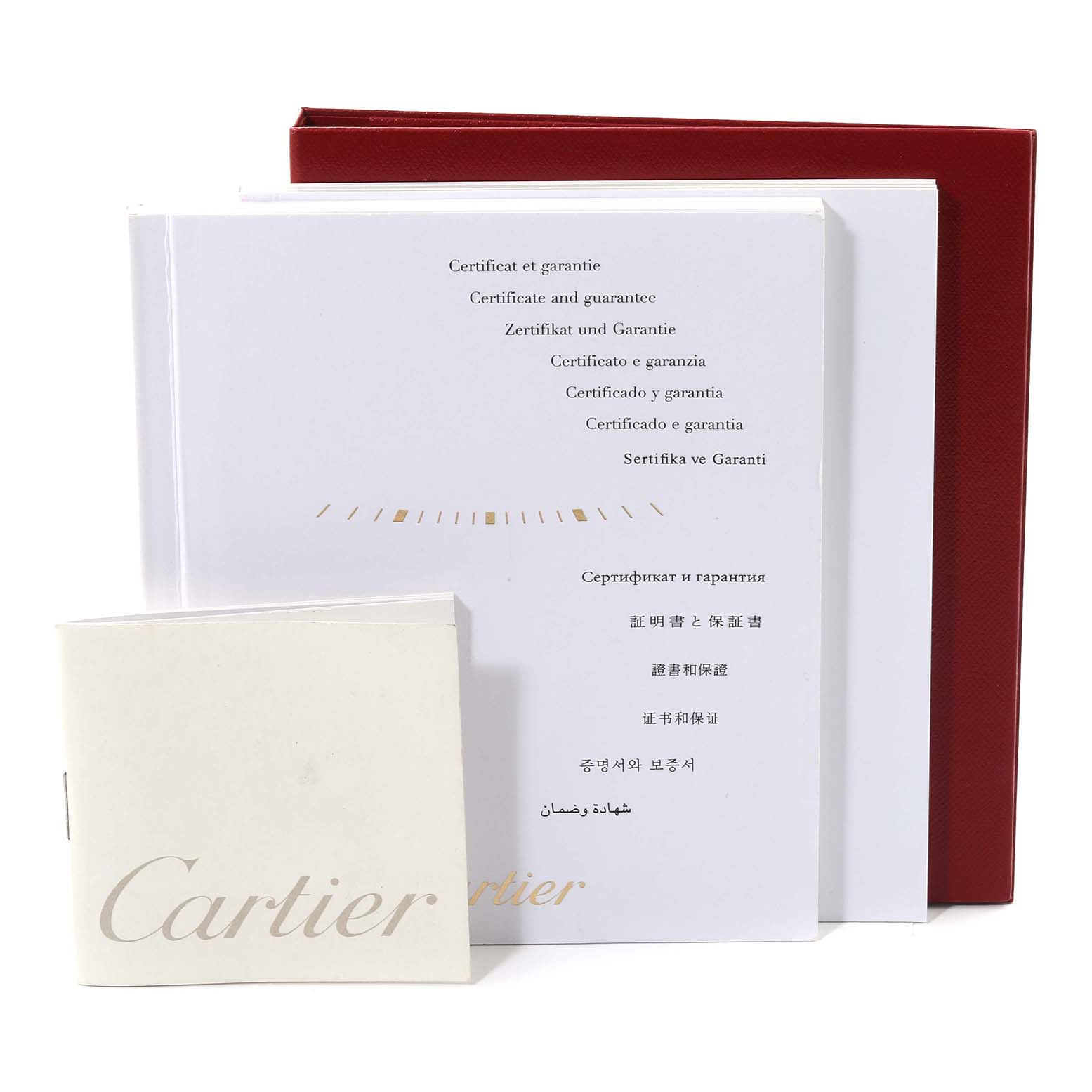 The image shows the warranty and certificate booklets for a Cartier Ballon Bleu W6920046 Women
s Stainless Steel Silver Dial W6920046 Women
s Stainless Steel Silver Dial watch, displayed upright.