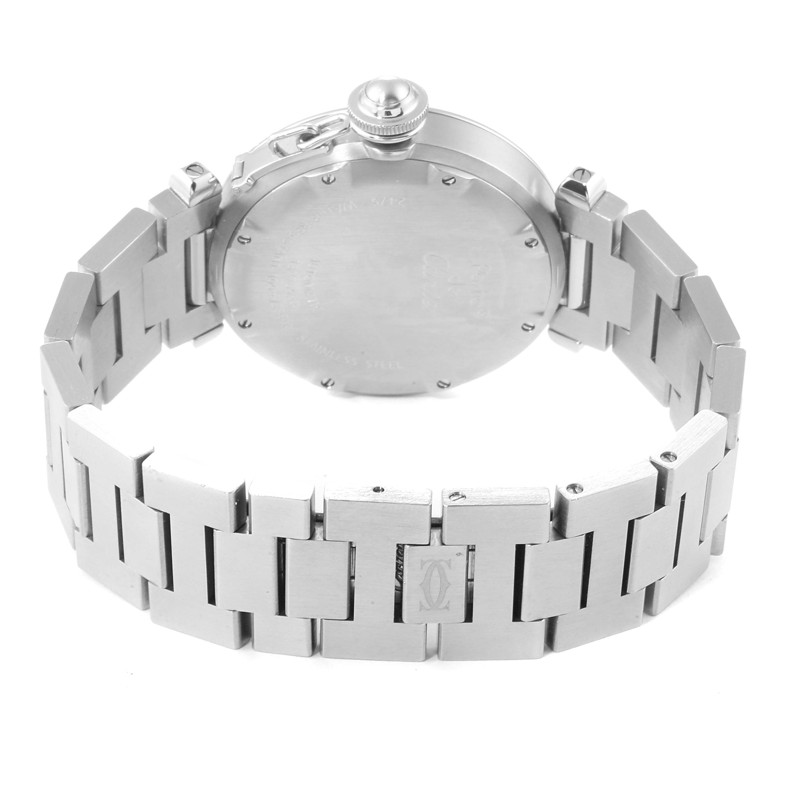 The image shows the back view of a Cartier Pasha W31058M7 Women
s Stainless Steel Pink Dial W31058M7 Women
s Stainless Steel Pink Dial watch, focusing on the case back and stainless steel bracelet.