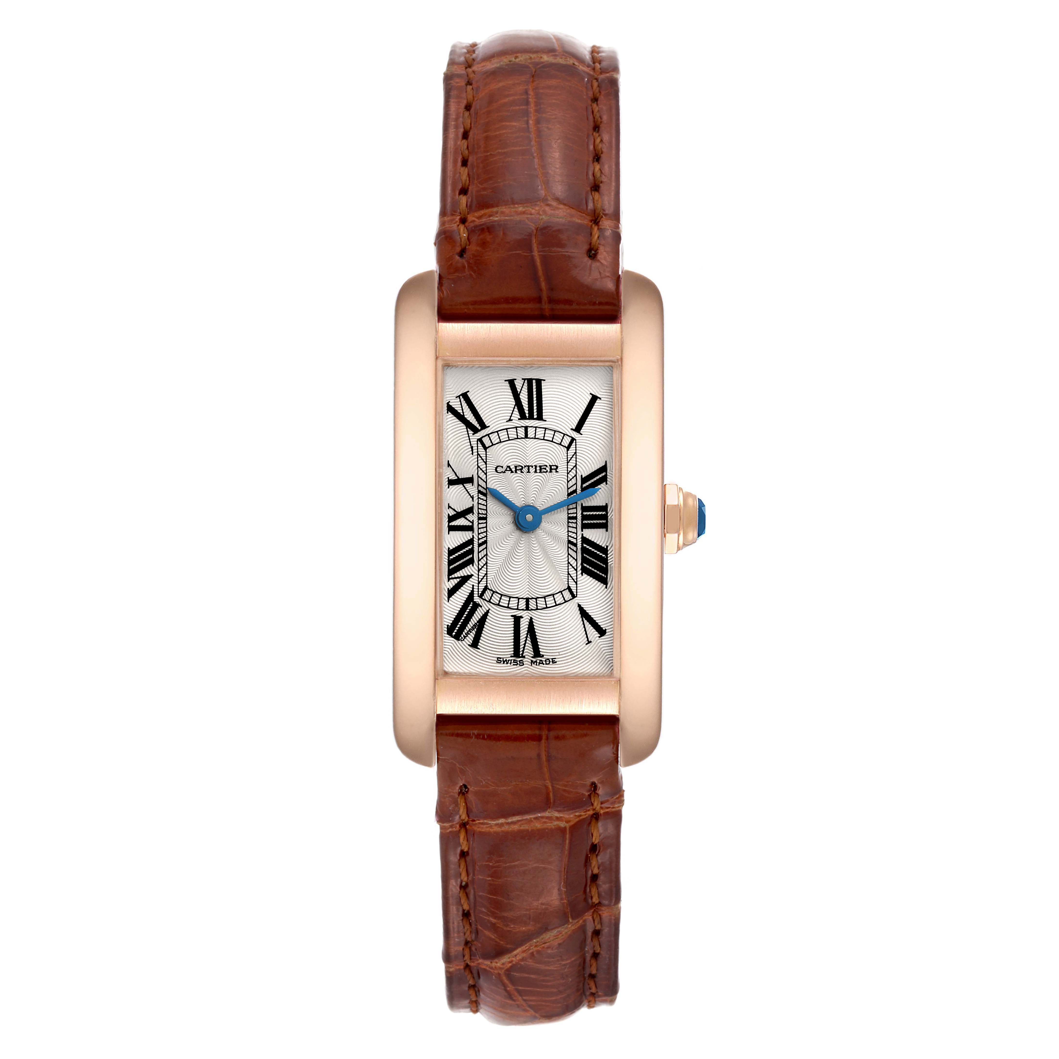 The image shows a Cartier Tank Americaine W2607456 Women's Rose Gold Silver Dial W2607456 Women's Rose Gold Silver Dial watch, front-facing, highlighting the rectangular face, Roman numerals, and brown leather strap.