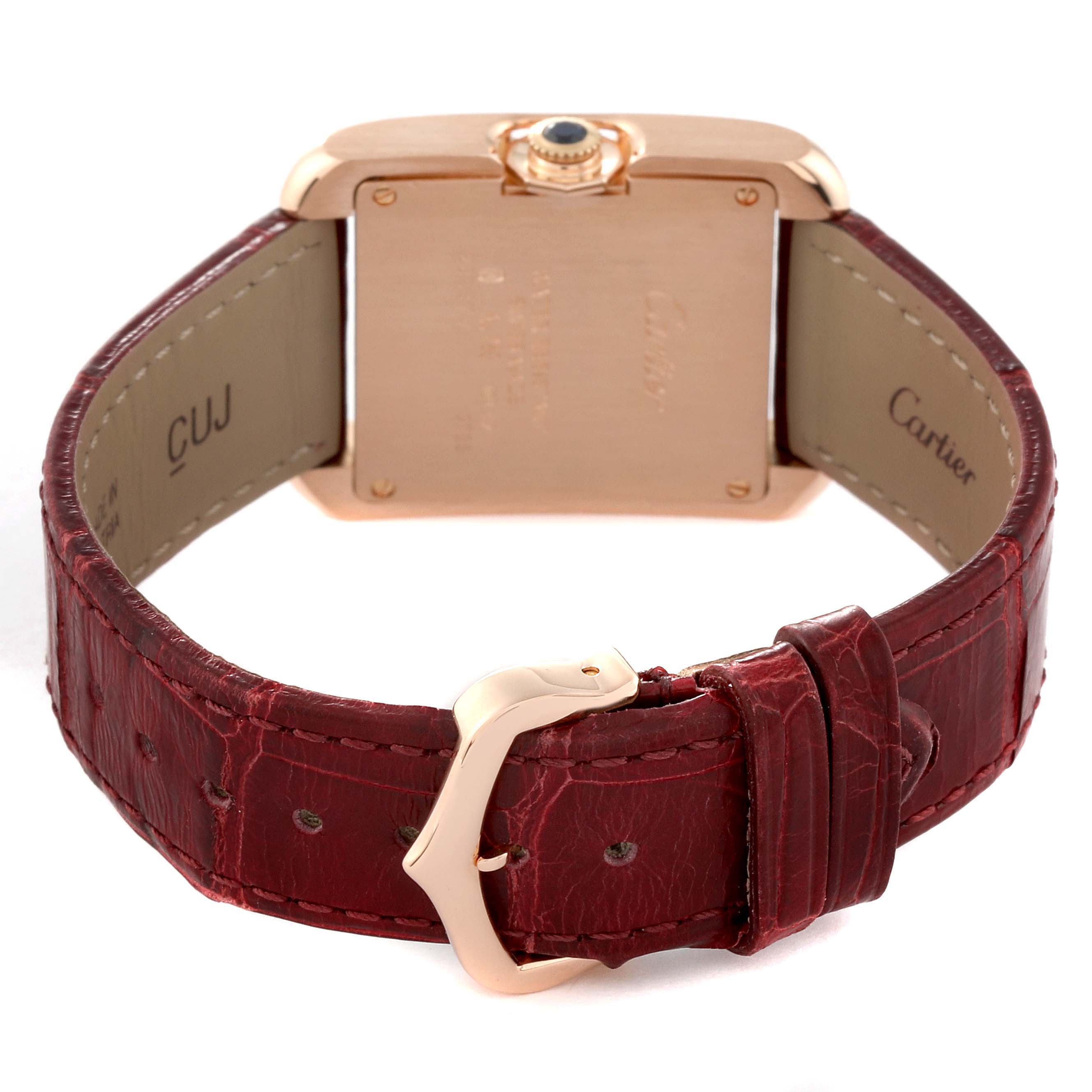 The image shows the back view of a Tank Anglaise model by Cartier, highlighting the case back, crown, and strap with its buckle.