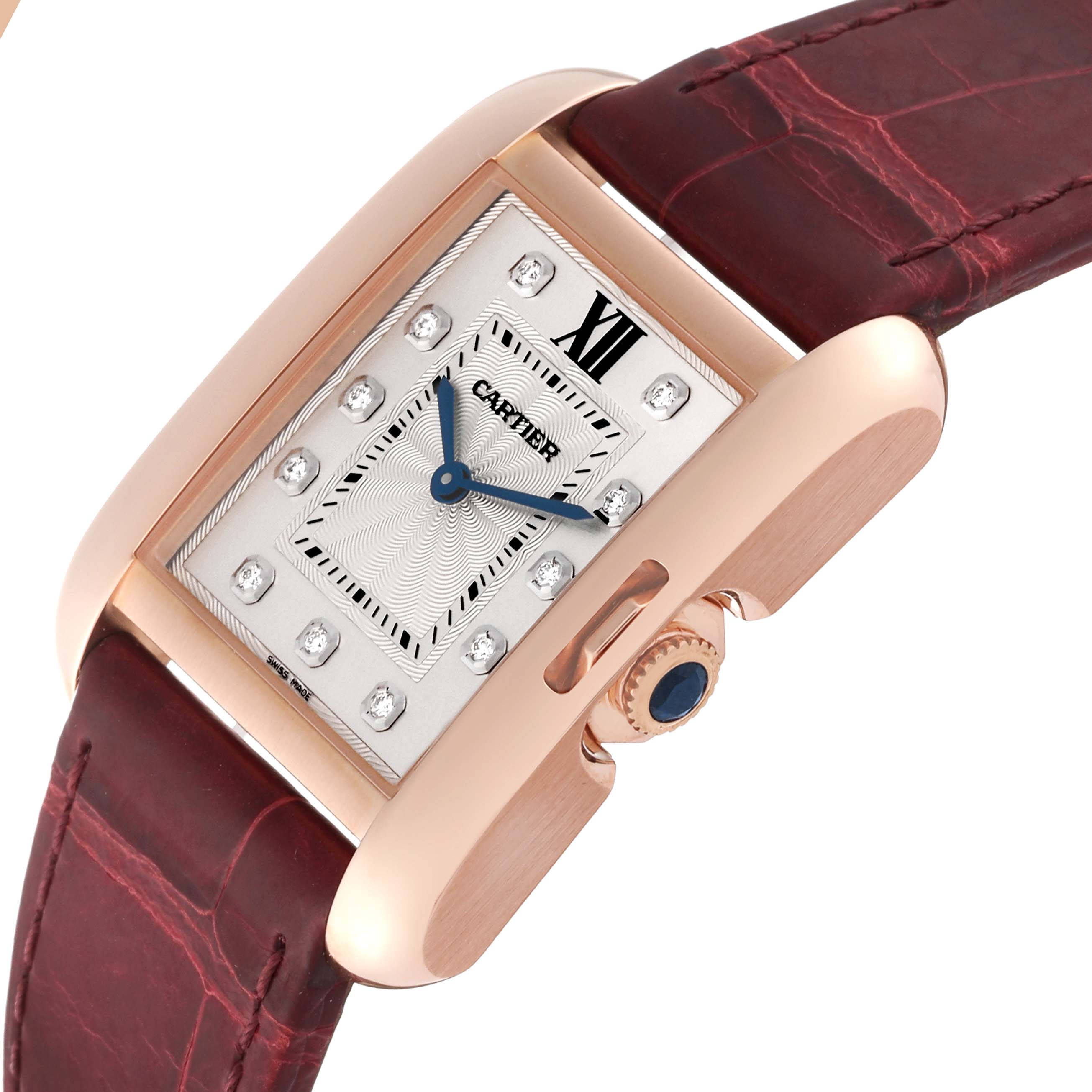 The Cartier Tank Anglaise WJTA0009 Women
s Rose Gold Silver Dial WJTA0009 Women
s Rose Gold Silver Dial watch is shown at an angle with a focus on the dial, crown, and strap.