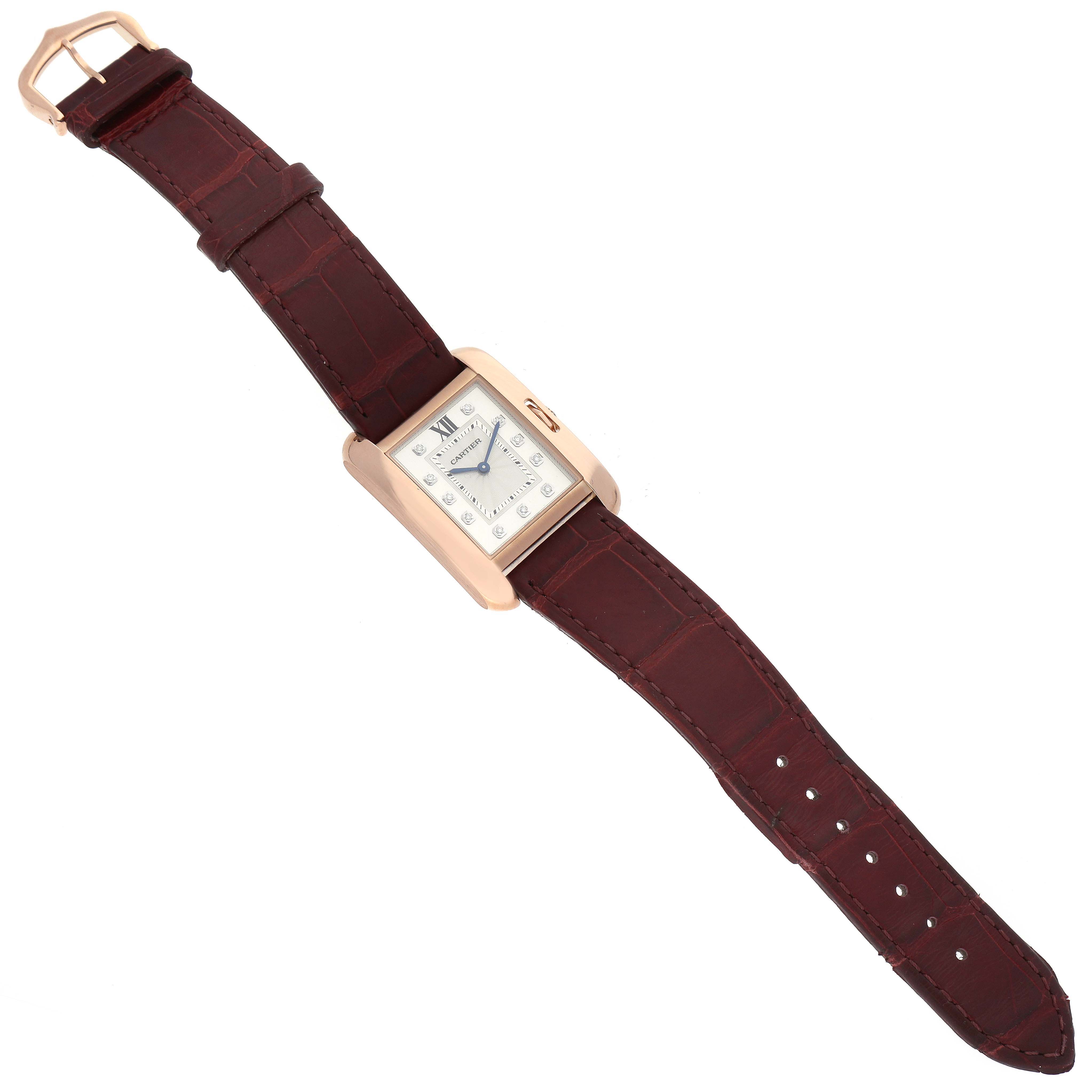 The image shows a Cartier Tank Anglaise WJTA0009 Women
s Rose Gold Silver Dial WJTA0009 Women
s Rose Gold Silver Dial watch laid out flat, displaying the face, strap, and buckle from a top-down angle.