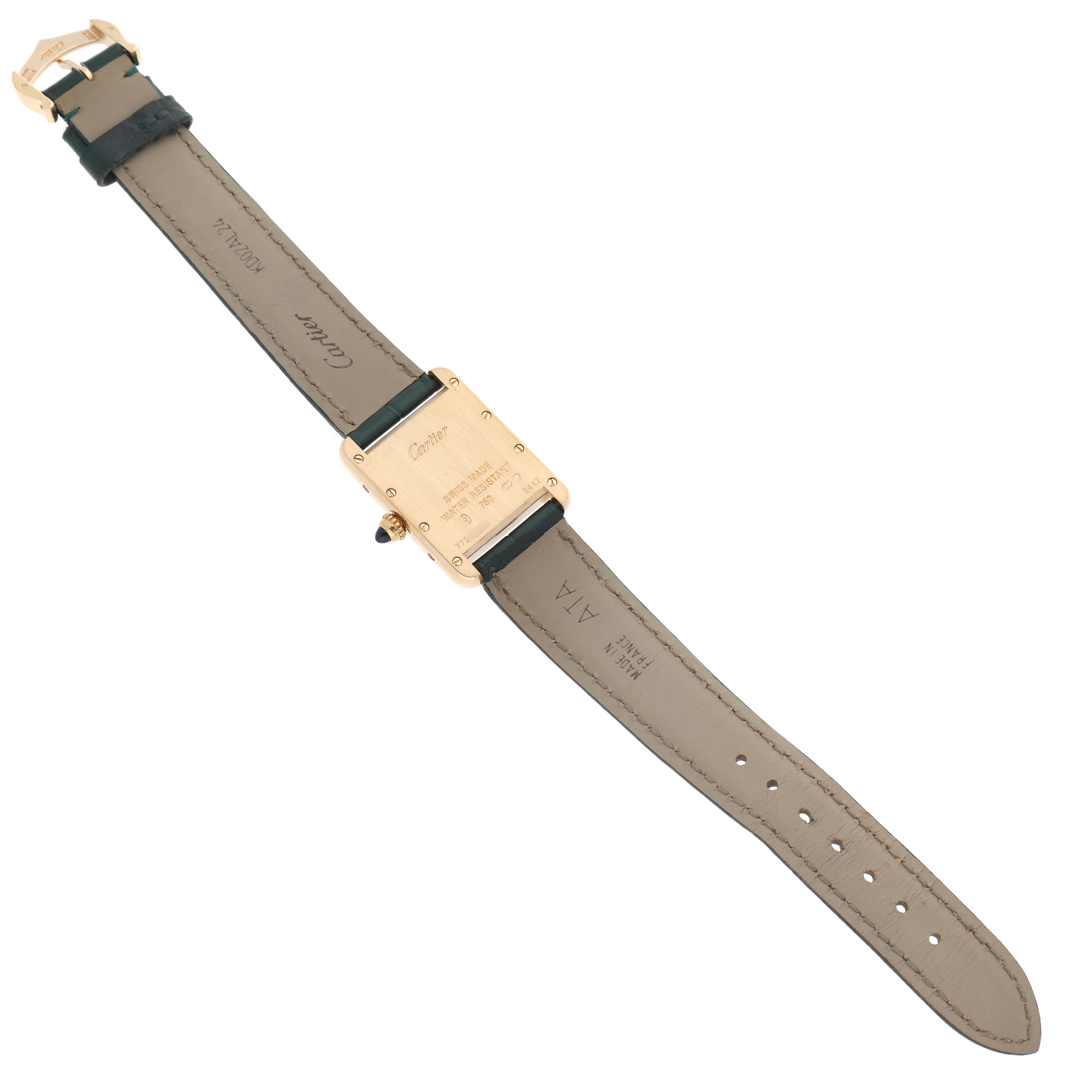 This image shows the back view of a Tank Louis watch by Cartier, displaying the strap and case back details.