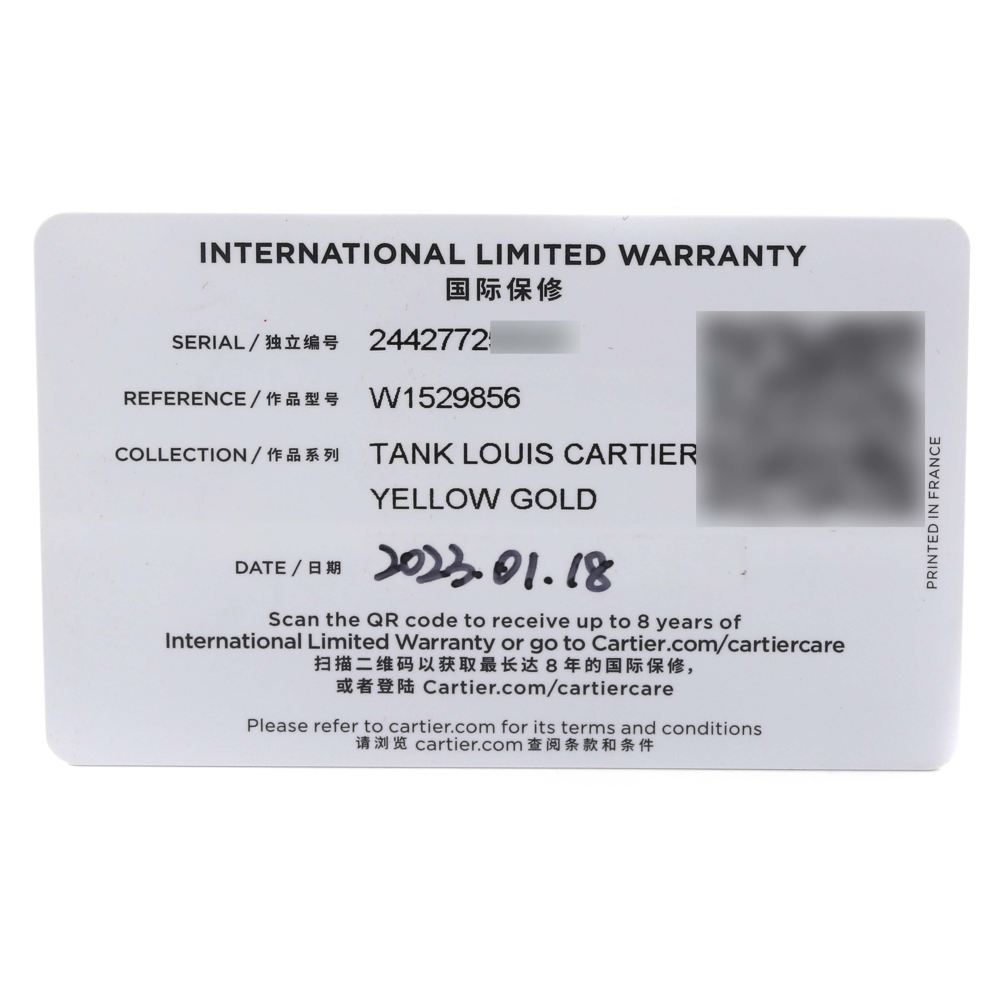 The image shows the international limited warranty card for the Tank Louis Cartier watch in yellow gold.