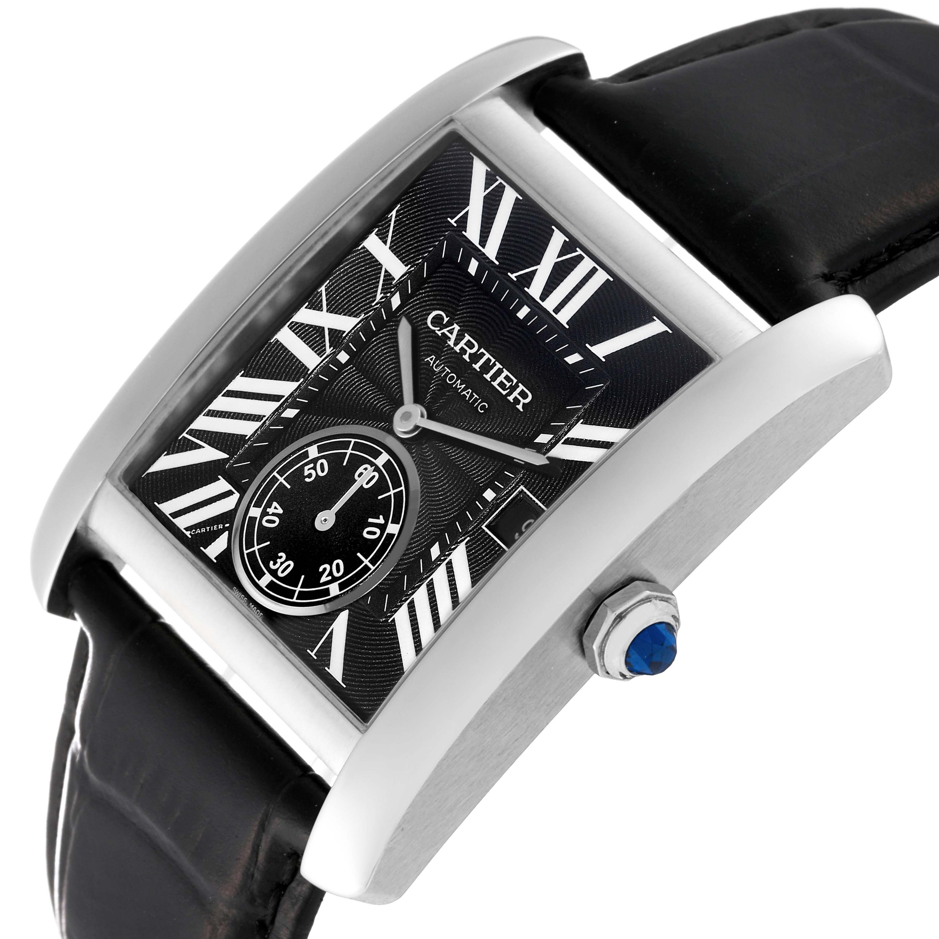 The Cartier Tank MC W5330004 Men
s Stainless Steel Black Dial W5330004 Men
s Stainless Steel Black Dial watch is shown at an angle, highlighting the black dial, Roman numerals, subdial, leather strap, and crown with sapphire cabochon.
