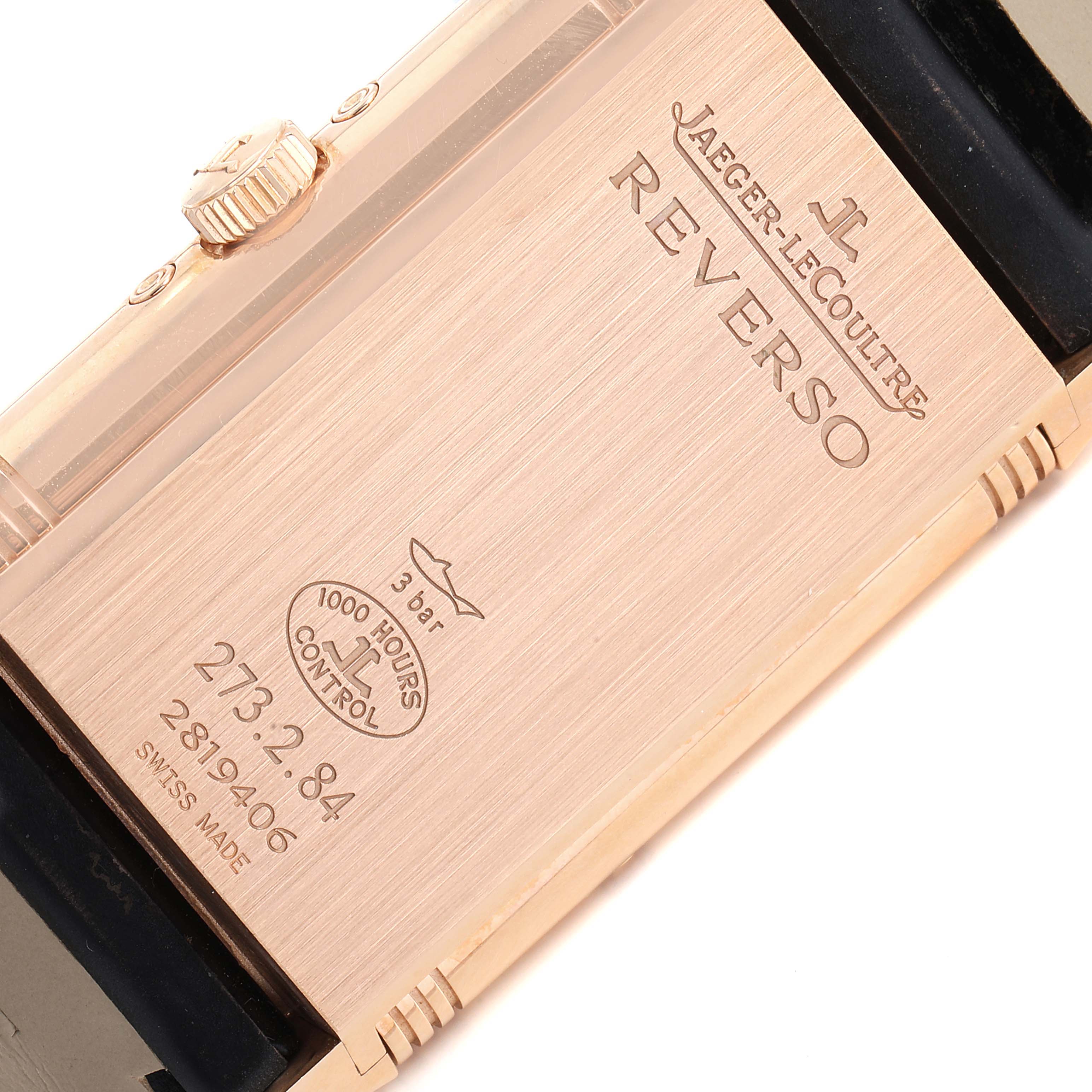 This image shows the backside of a Jaeger-LeCoultre Reverso watch, highlighting the engravings and case details.
