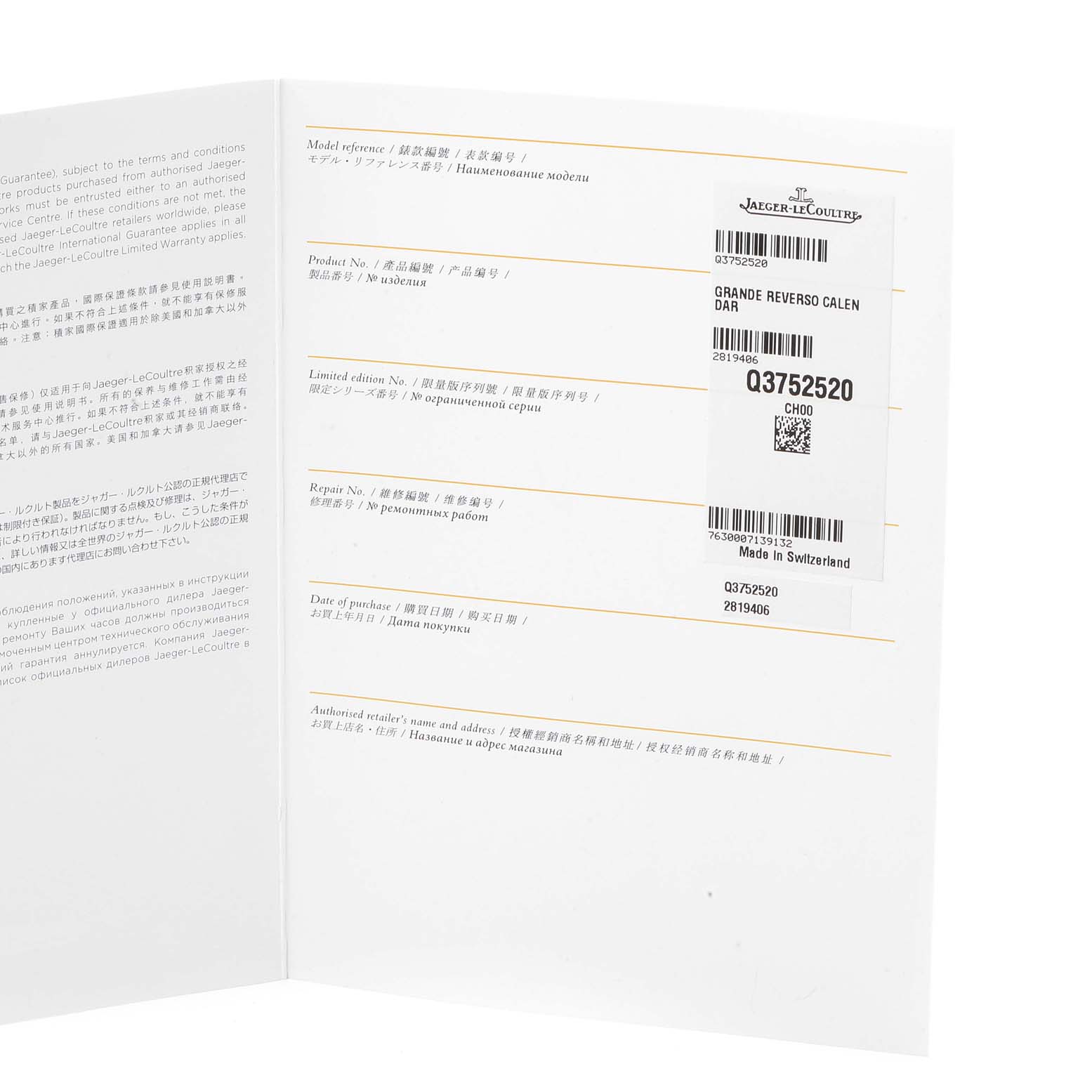 The image shows a detailed angle of the warranty and instruction booklet for the Jaeger-LeCoultre Reverso watch model.