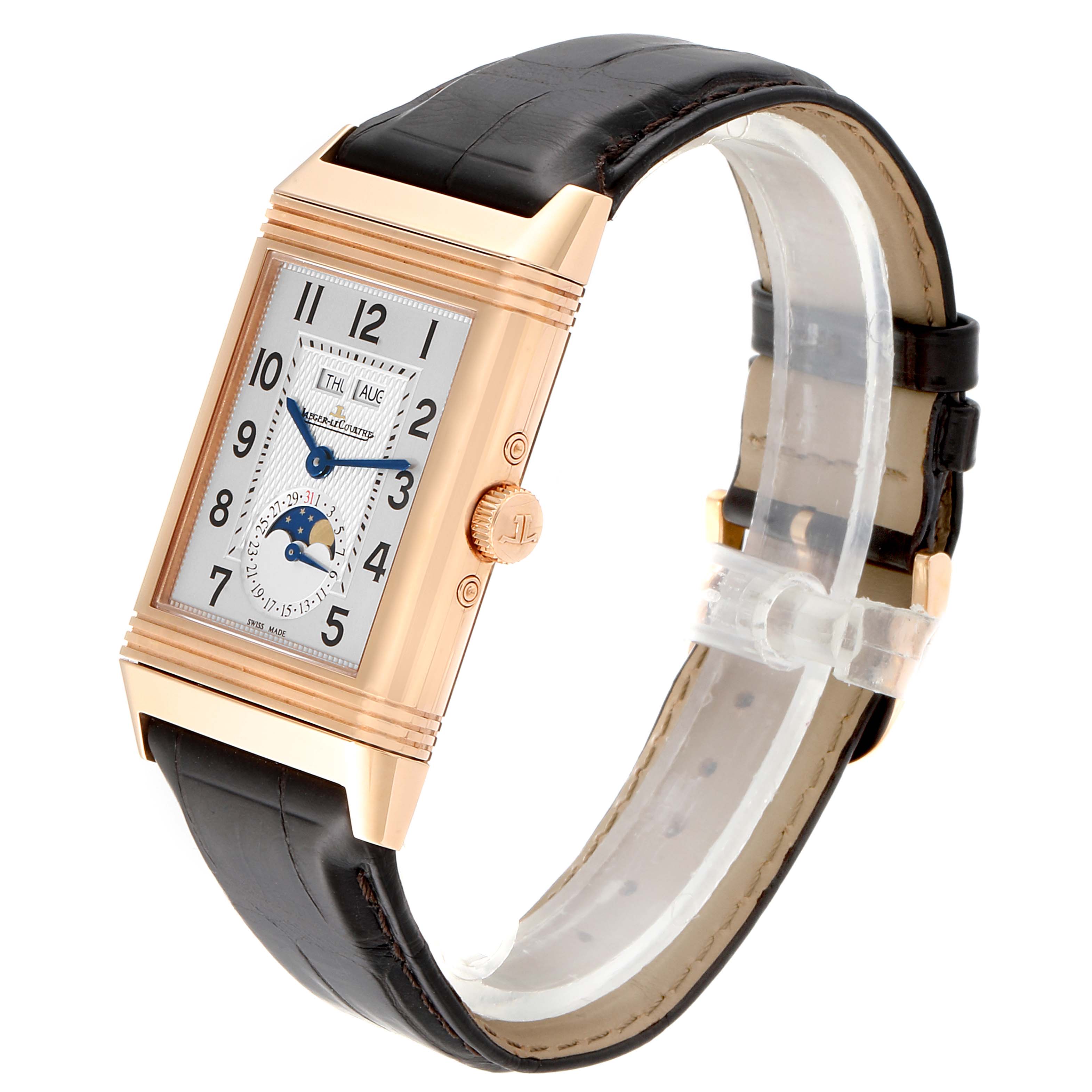 This image showcases a Jaeger-LeCoultre Reverso watch at a three-quarter angle, highlighting its rectangular face, crown, and leather strap.