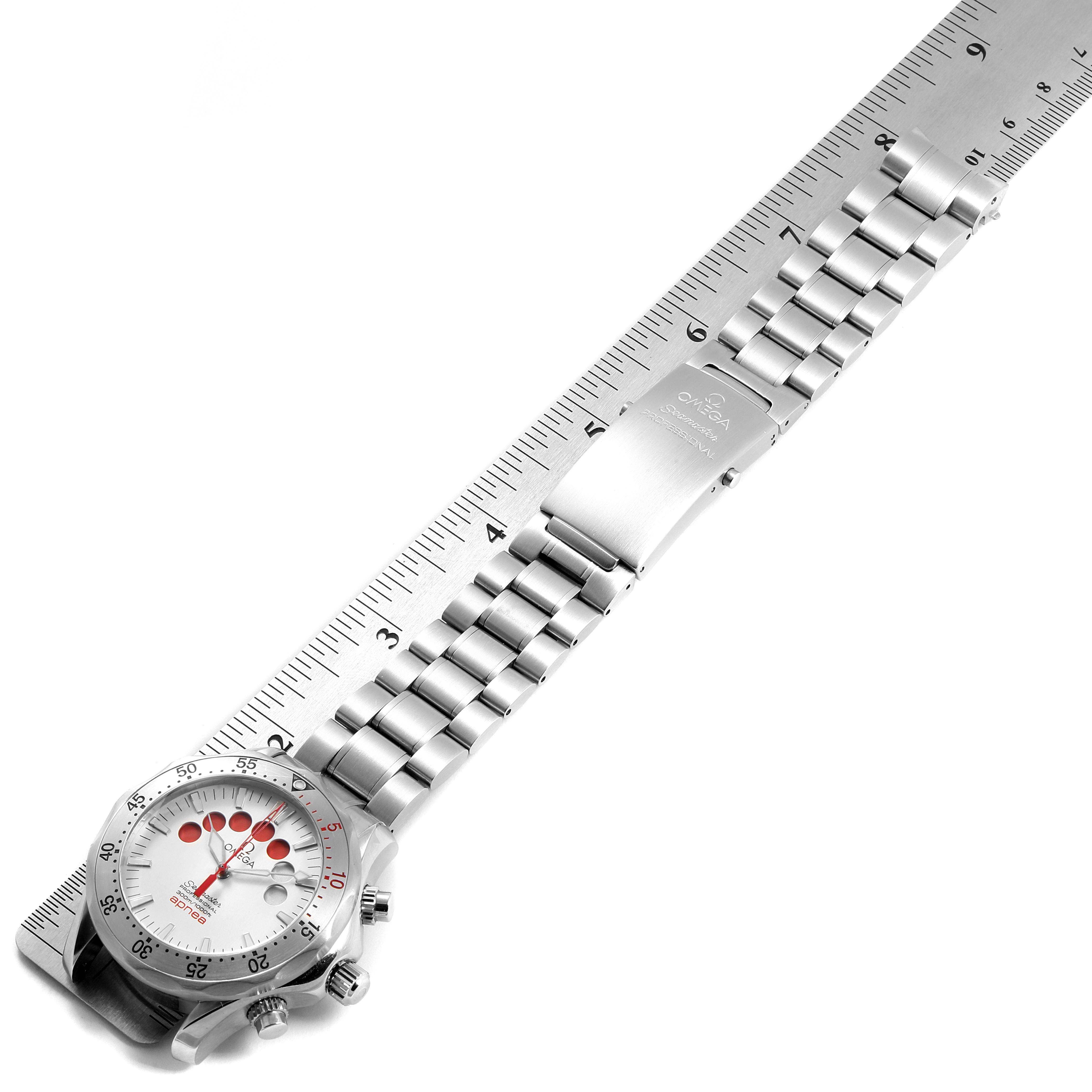 The image shows the Omega Seamaster 2595.30.00 Men
s Stainless Steel Silver Dial 2595.30.00 Men
s Stainless Steel Silver Dial watch laid flat with its bracelet and clasp fully extended alongside a ruler.