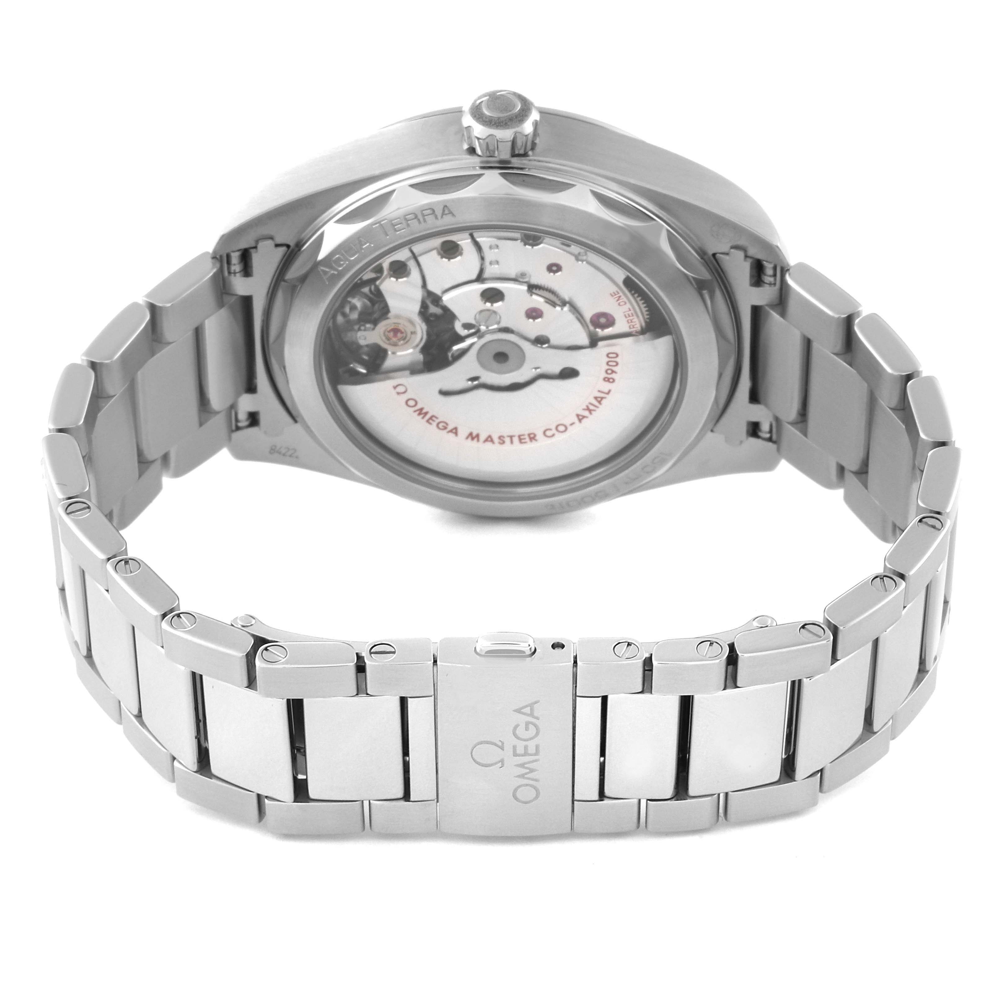 The image shows the back view of the Aqua Terra model by Omega, highlighting the bracelet and the transparent case back displaying the movement.