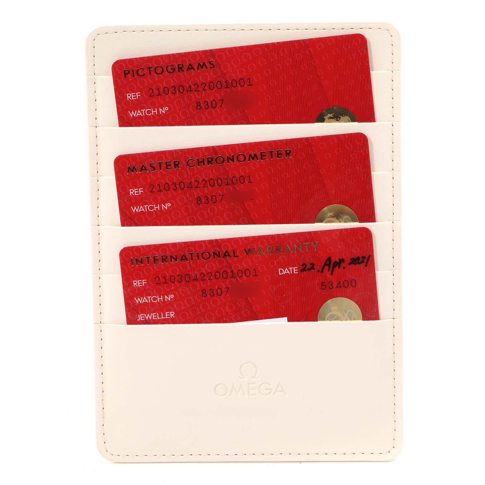 This image shows the warranty cards and certifications for an Omega Seamaster 210.30.42.20.01.001 Men's Stainless Steel Black Dial 210.30.42.20.01.001 Men's Stainless Steel Black Dial watch kept in a cream-colored card holder.