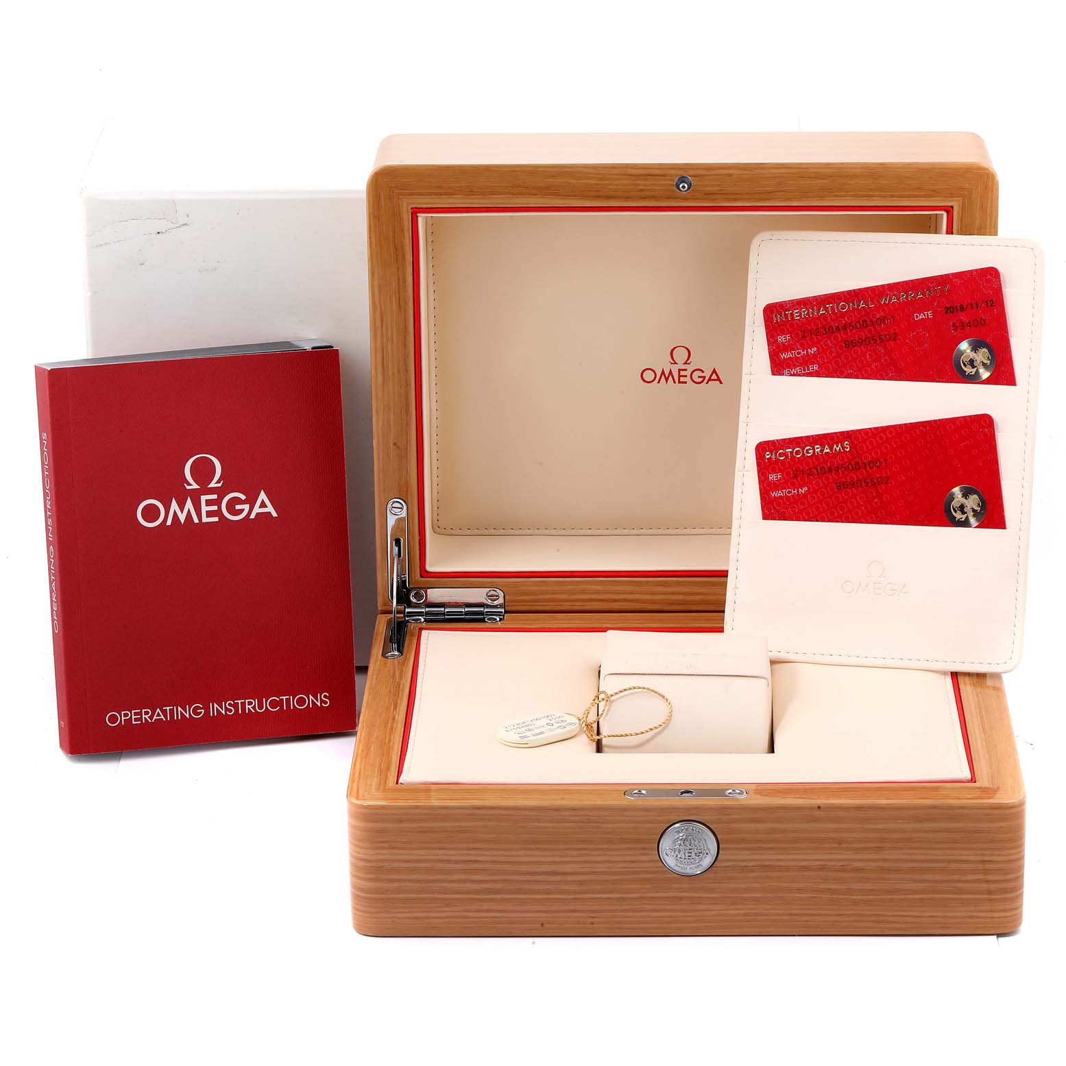 The image shows the watch box, manual, warranty cards, and accessories for an Omega Seamaster 212.30.44.50.01.001 Men
s Stainless Steel Black Dial 212.30.44.50.01.001 Men
s Stainless Steel Black Dial model.