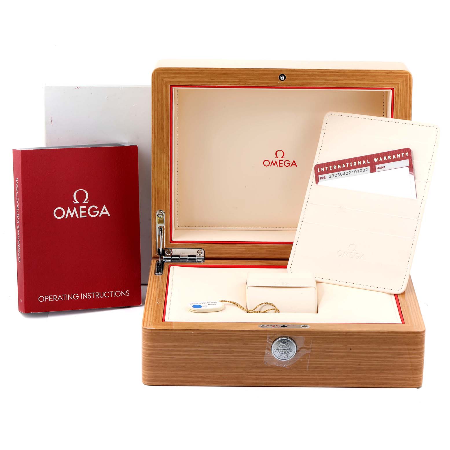 The image shows an Omega Planet Ocean 232.30.42.21.01.002 Men
s Stainless Steel Black Dial 232.30.42.21.01.002 Men
s Stainless Steel Black Dial watch
s wooden box, warranty card, and operating instructions booklet.