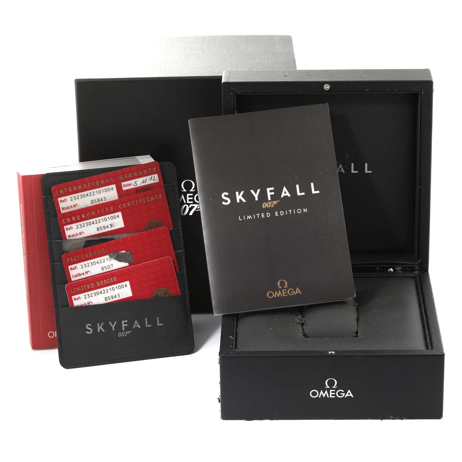 The image shows the Omega Planet Ocean 232.30.42.21.01.004 Men
s Stainless Steel Black Dial 232.30.42.21.01.004 Men
s Stainless Steel Black Dial "Skyfall" limited edition watch box, warranty cards, and booklet.