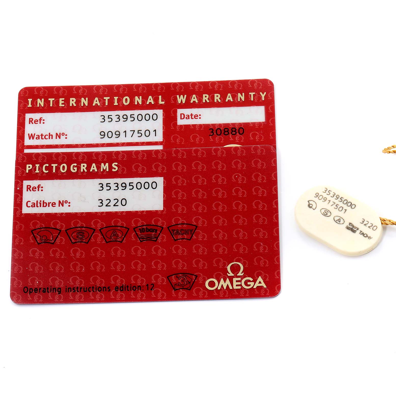 The image shows an Omega Speedmaster 3539.50.00 Men
s Stainless Steel Black Dial 3539.50.00 Men
s Stainless Steel Black Dial International Warranty card and a matching tag with reference and calibre numbers.