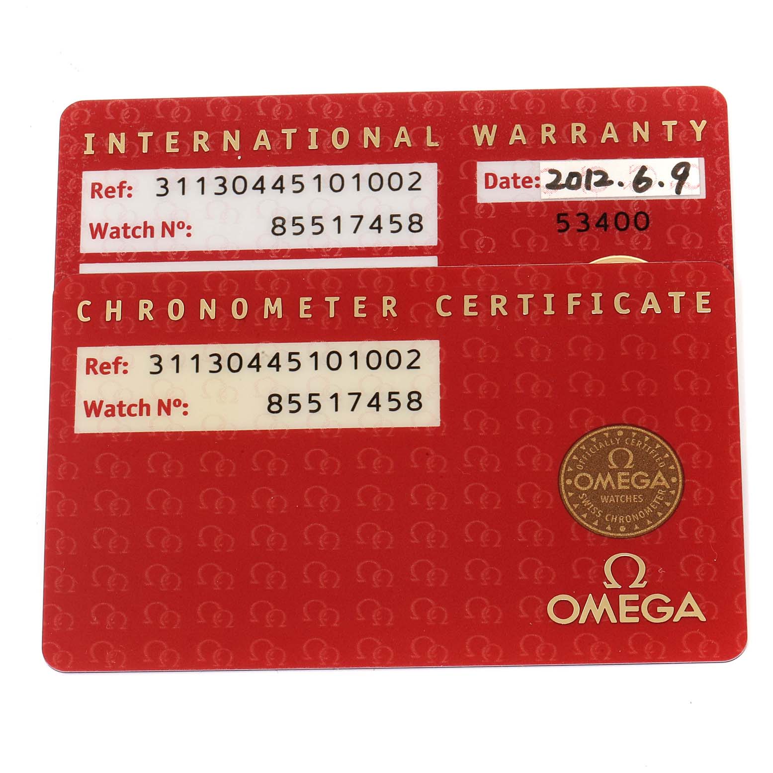 The image shows an Omega Speedmaster 311.30.44.51.01.002 Men
s Stainless Steel Black Dial 311.30.44.51.01.002 Men
s Stainless Steel Black Dial International Warranty and Chronometer Certificate card.