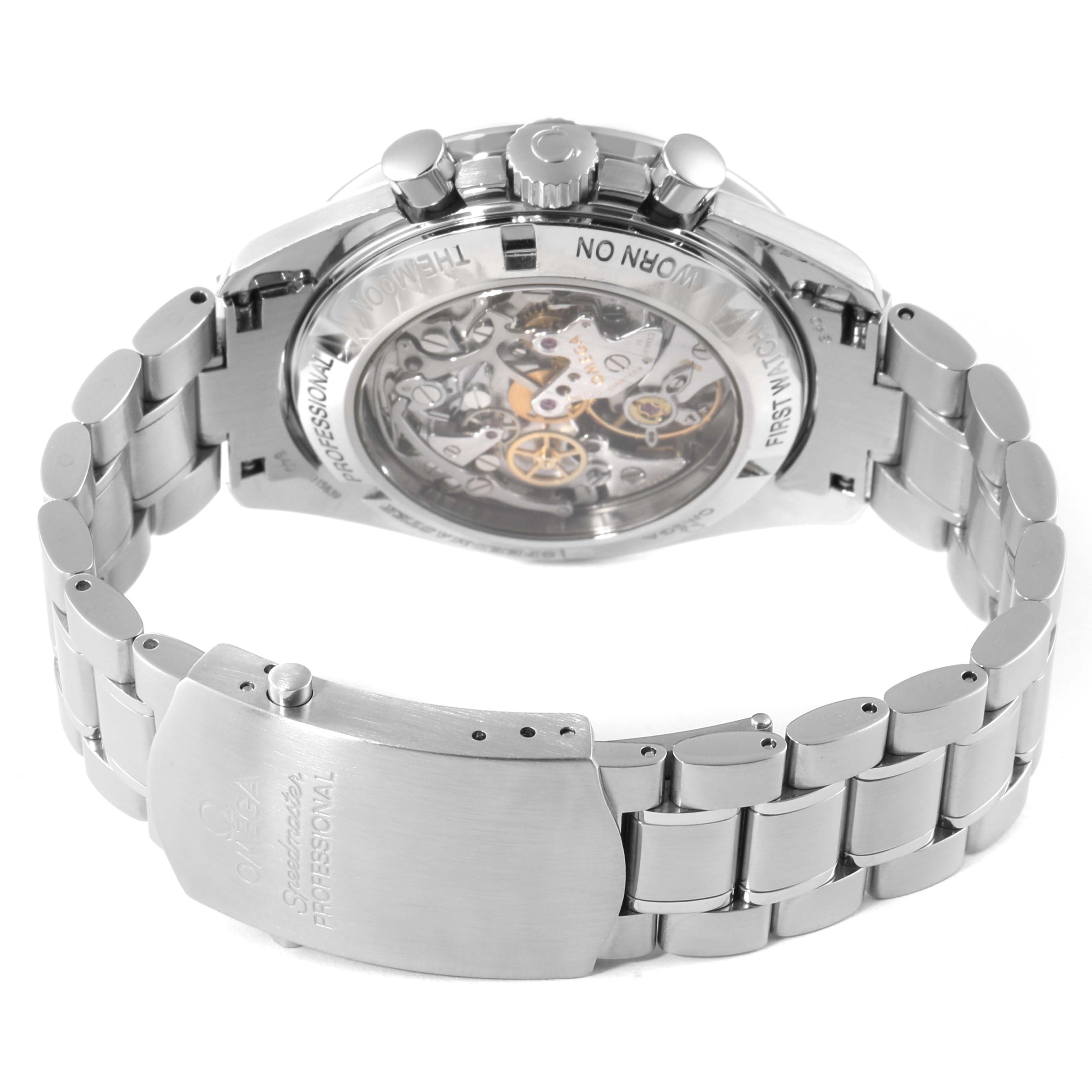 The image shows the back view of the Omega Speedmaster 3572.50.00 Men
s Stainless Steel Black Dial 3572.50.00 Men
s Stainless Steel Black Dial watch, highlighting the case back and bracelet clasp.