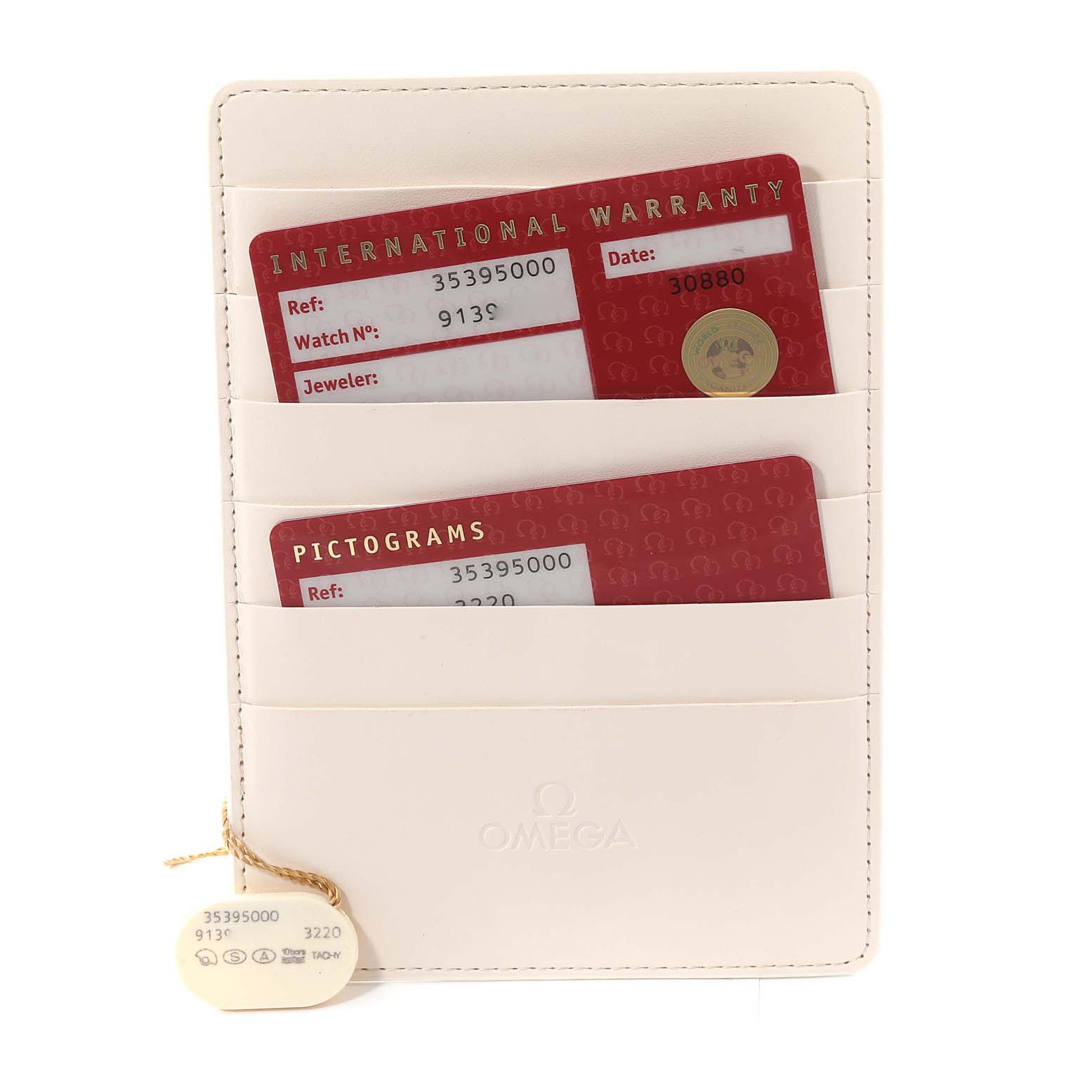 This image shows warranty and pictogram cards in a white Omega Speedmaster 3539.50.00 Men
s Stainless Steel Black Dial 3539.50.00 Men
s Stainless Steel Black Dial cardholder, tagged with model information.