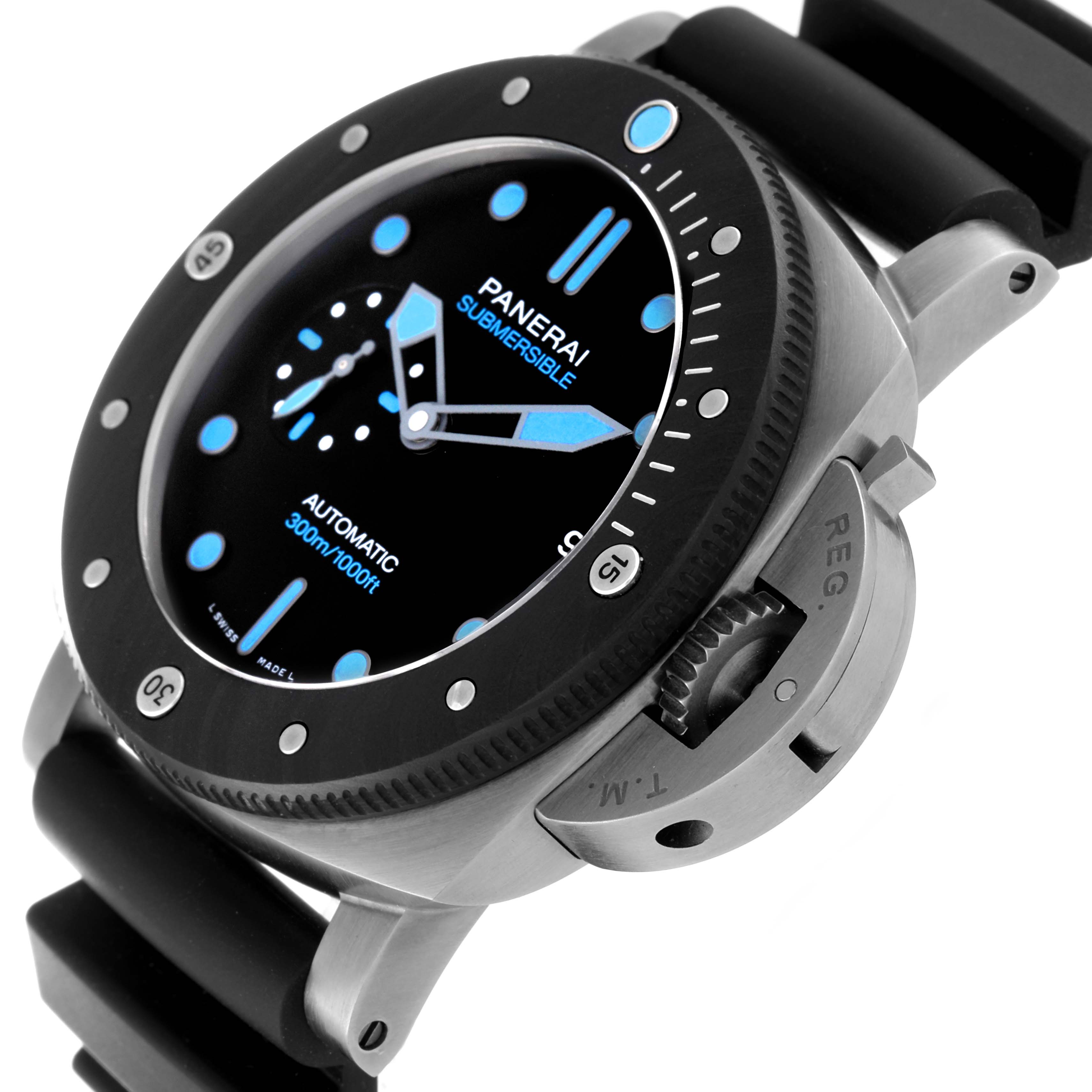 The Panerai Submersible PAM00799 Mens Titanium Black Dial watch is shown at an angle highlighting the bezel, crown guard, and rubber strap.