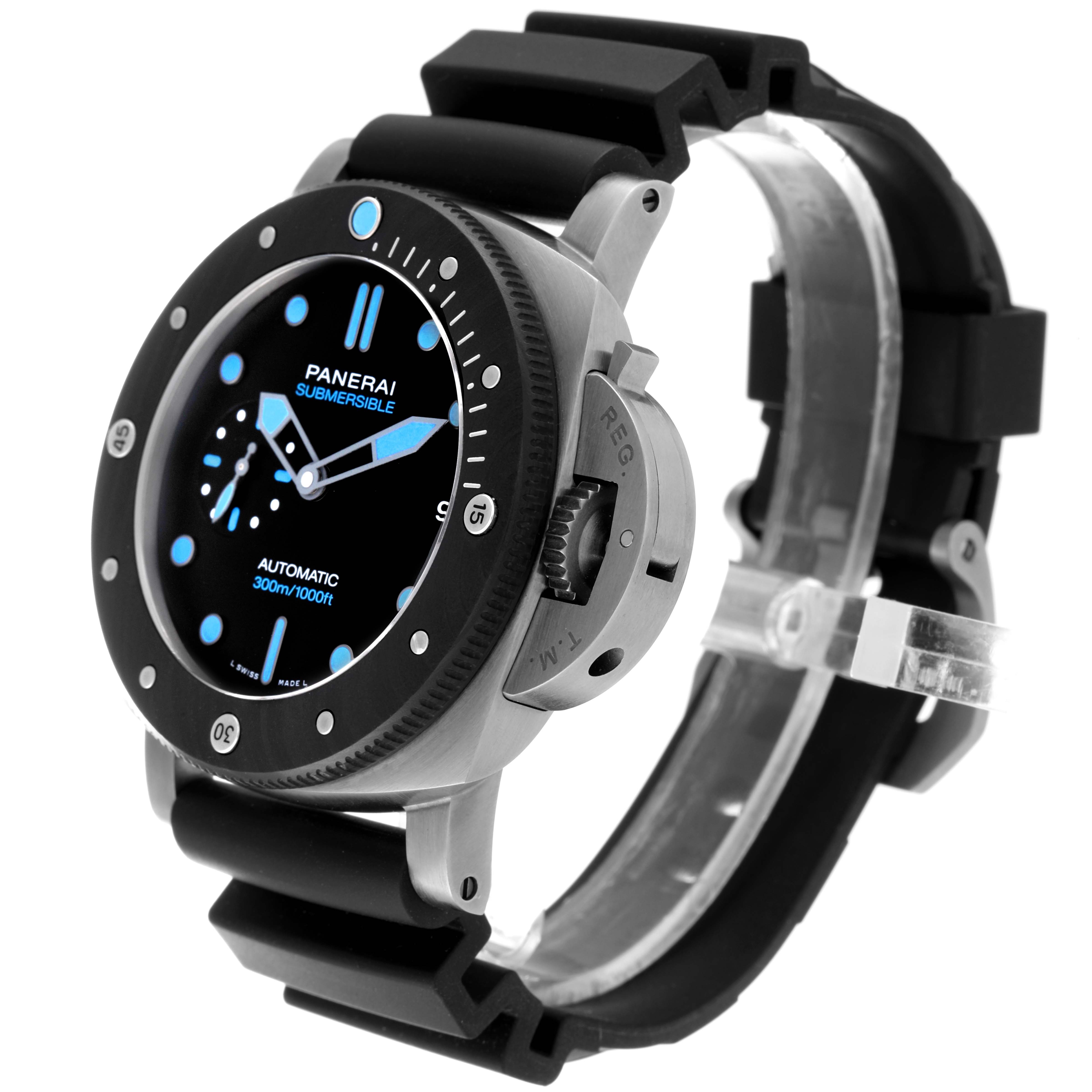 The Panerai Submersible PAM00799 Mens Titanium Black Dial watch is shown from a front-side angle, highlighting the dial, crown guard, and rubber strap.