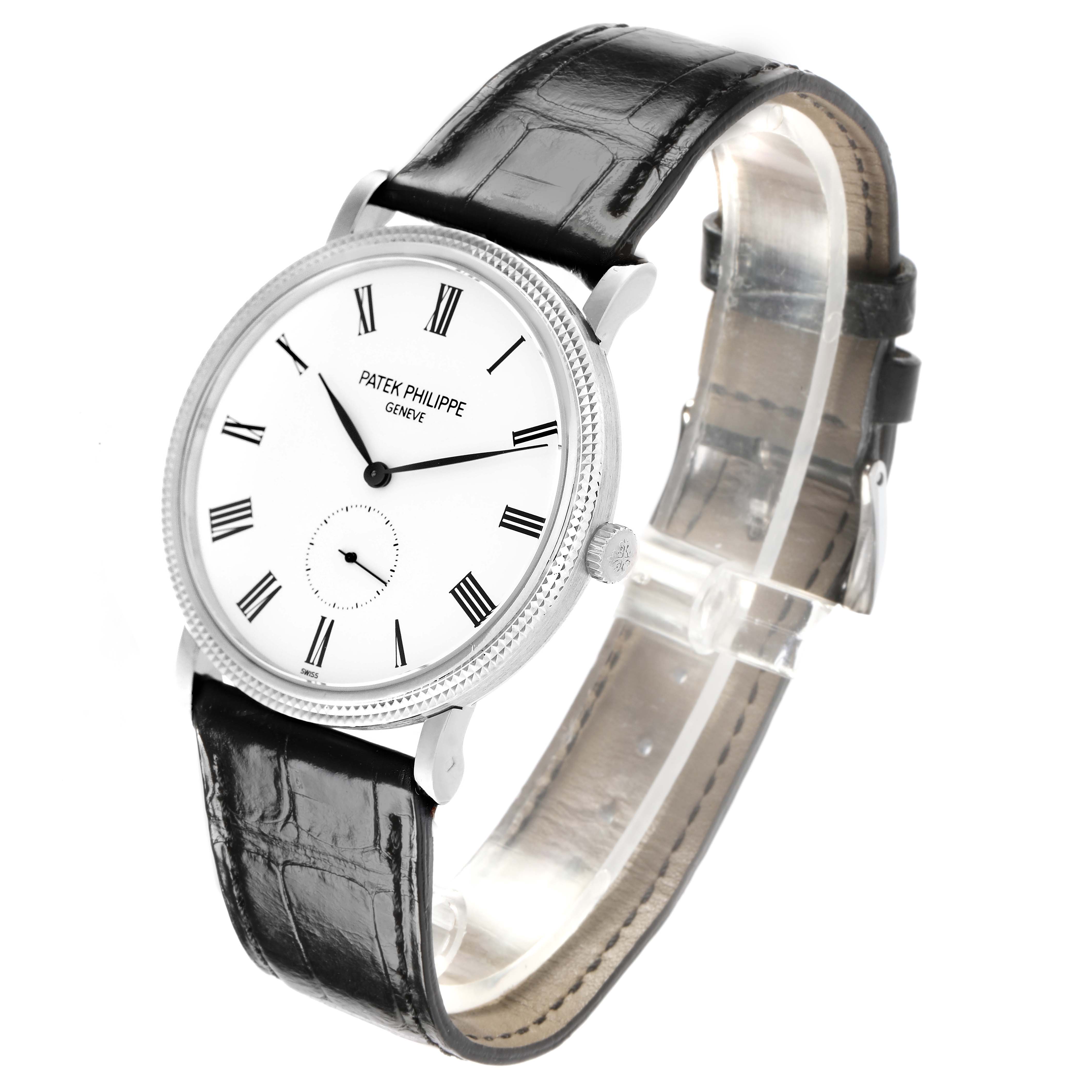 The Patek Philippe Calatrava 5119G-001 Men's White Gold White Dial watch is shown at a slight angle, displaying the face, bezel, crown, and leather strap.