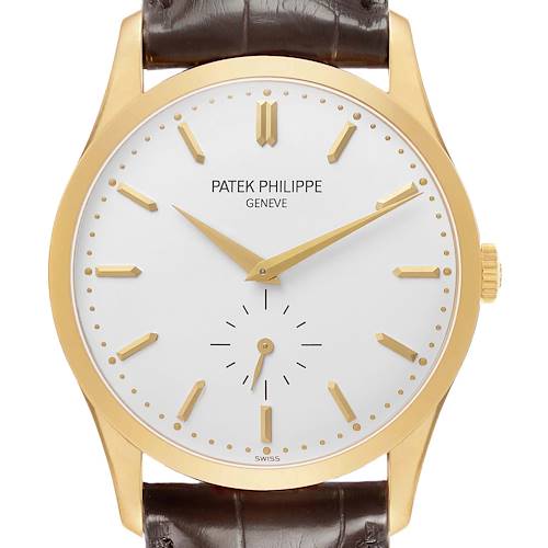 The image shows a Patek Philippe Calatrava 5196J Men's Yellow Gold Silver Dial watch from a front angle, highlighting the dial, hands, and case.