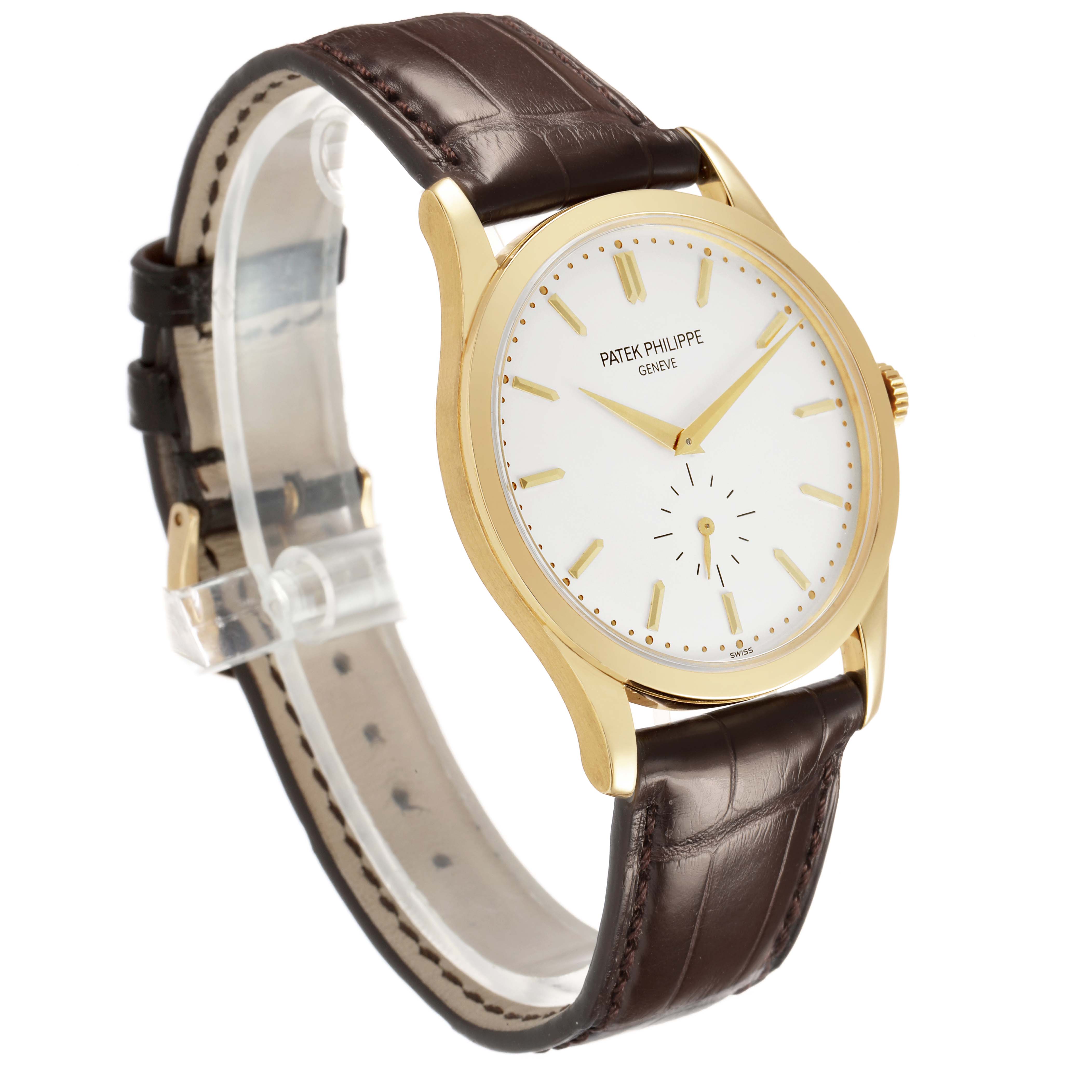 The Patek Philippe Calatrava 5196J Men's Yellow Gold Silver Dial watch is shown at a three-quarter angle, highlighting the gold case, white dial, and brown leather strap.