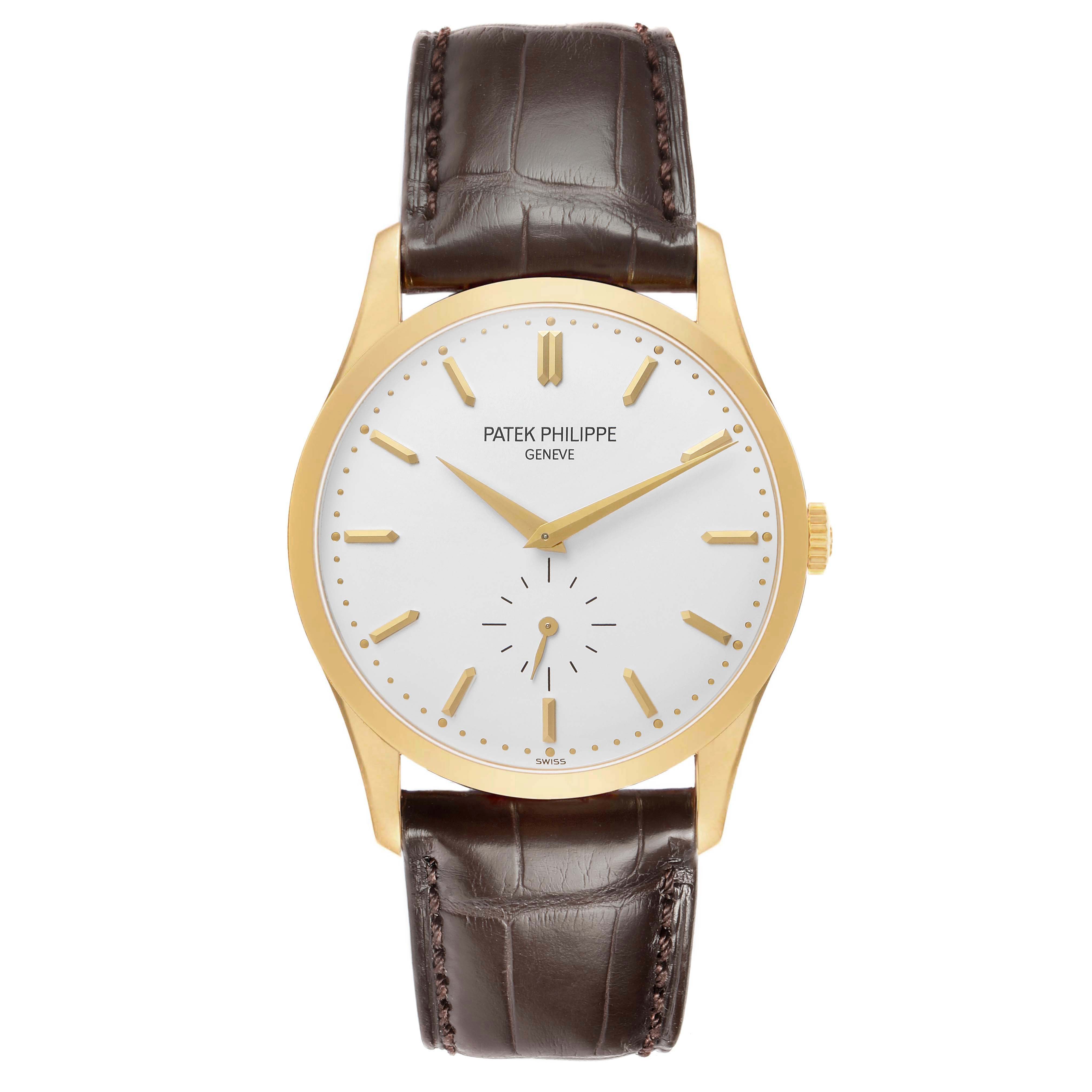 The Patek Philippe Calatrava 5196J Men's Yellow Gold Silver Dial watch is shown from a front view, displaying the face, gold case, and brown leather strap.