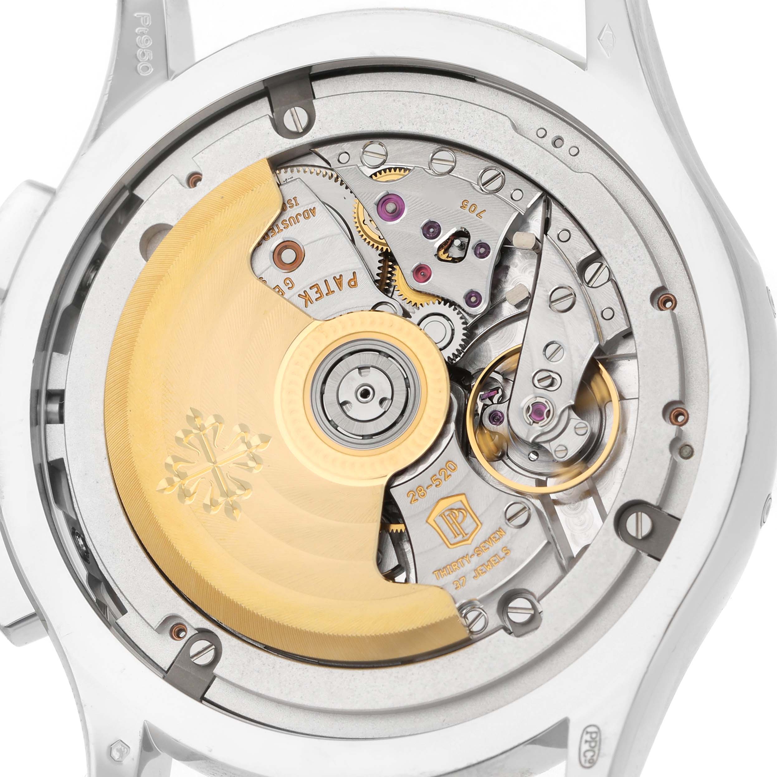 This image shows the back view of a Patek Philippe Complications 5905 Men's Platinum Black Dial model, highlighting its intricate movement and rotor.